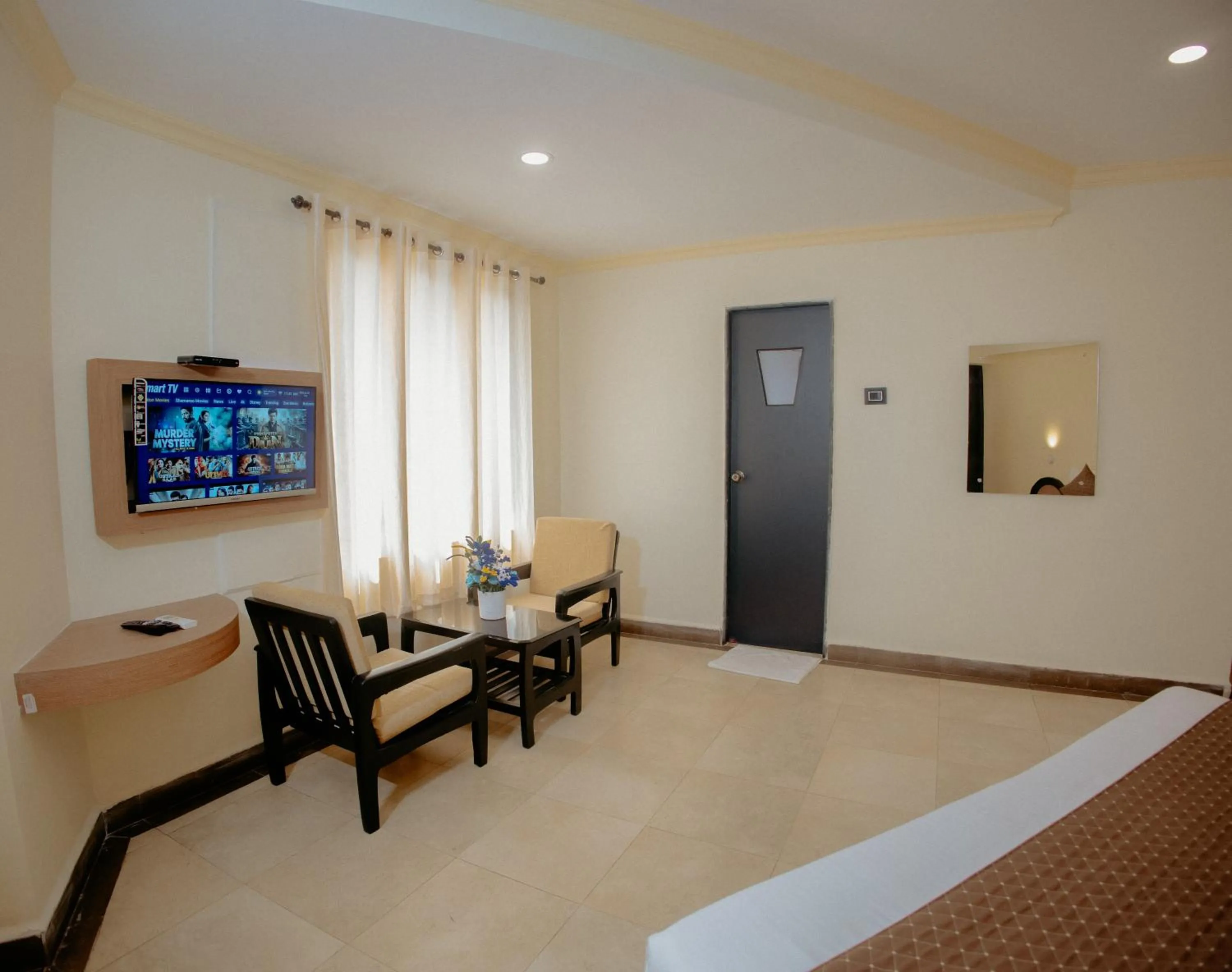 Seating area in Om Shiv Hotel