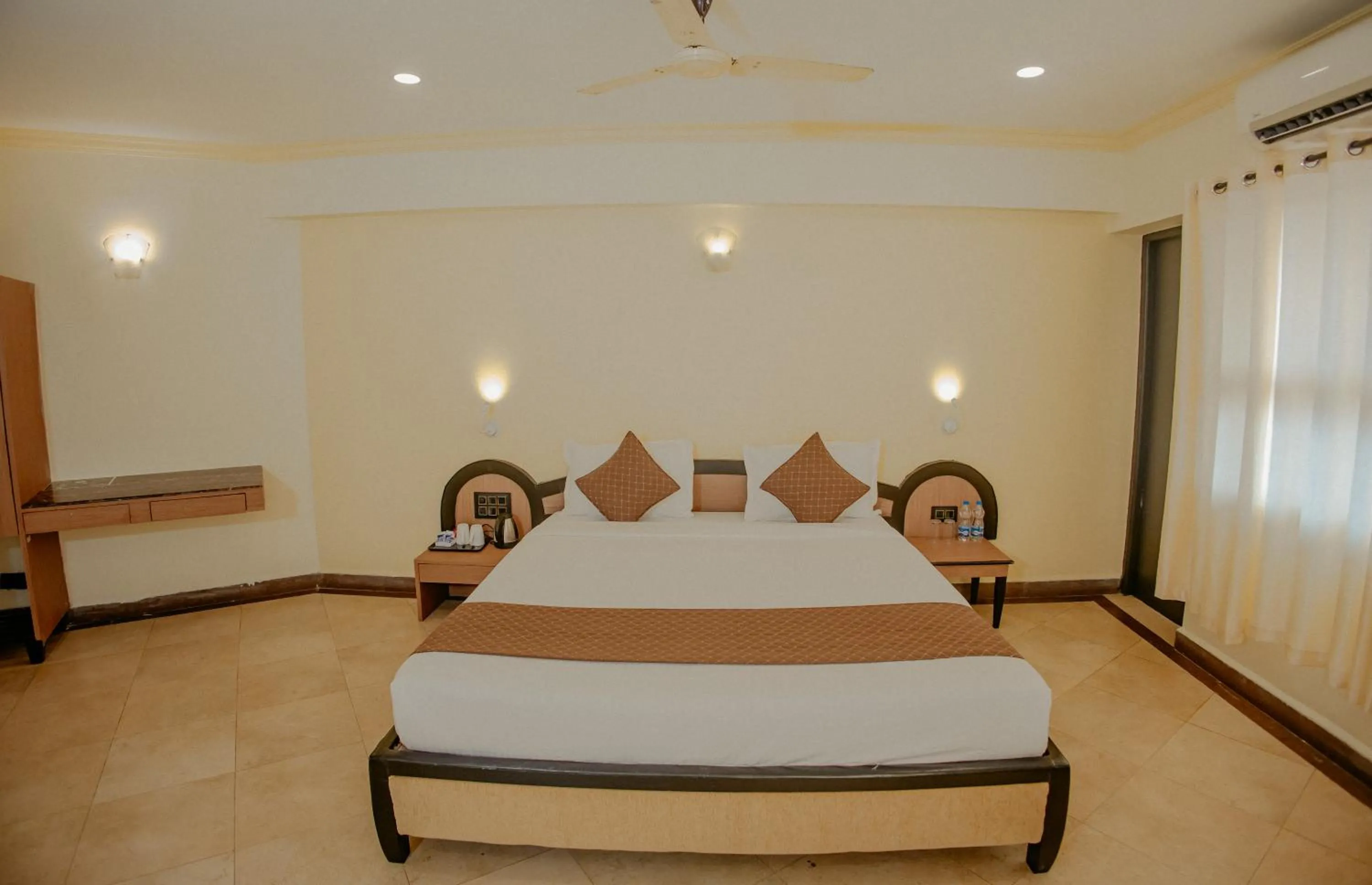 Bed in Om Shiv Hotel
