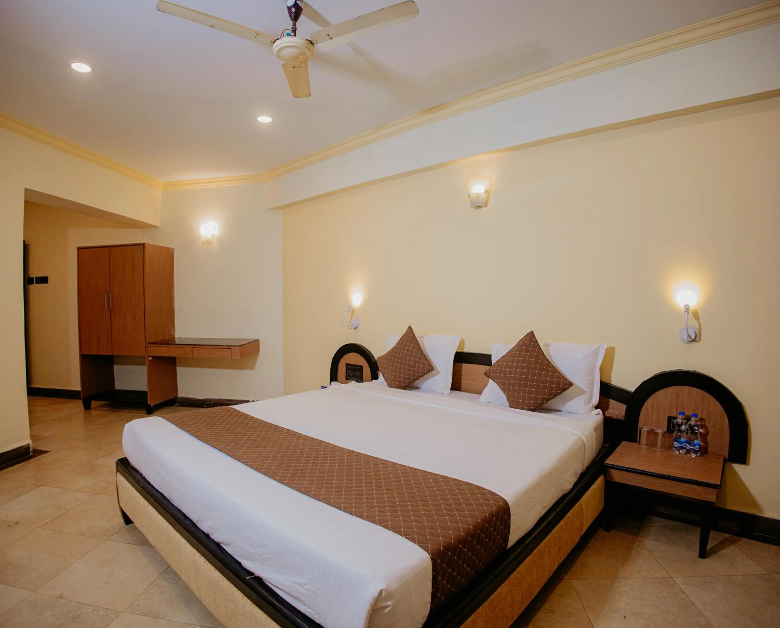 Bed in Om Shiv Hotel