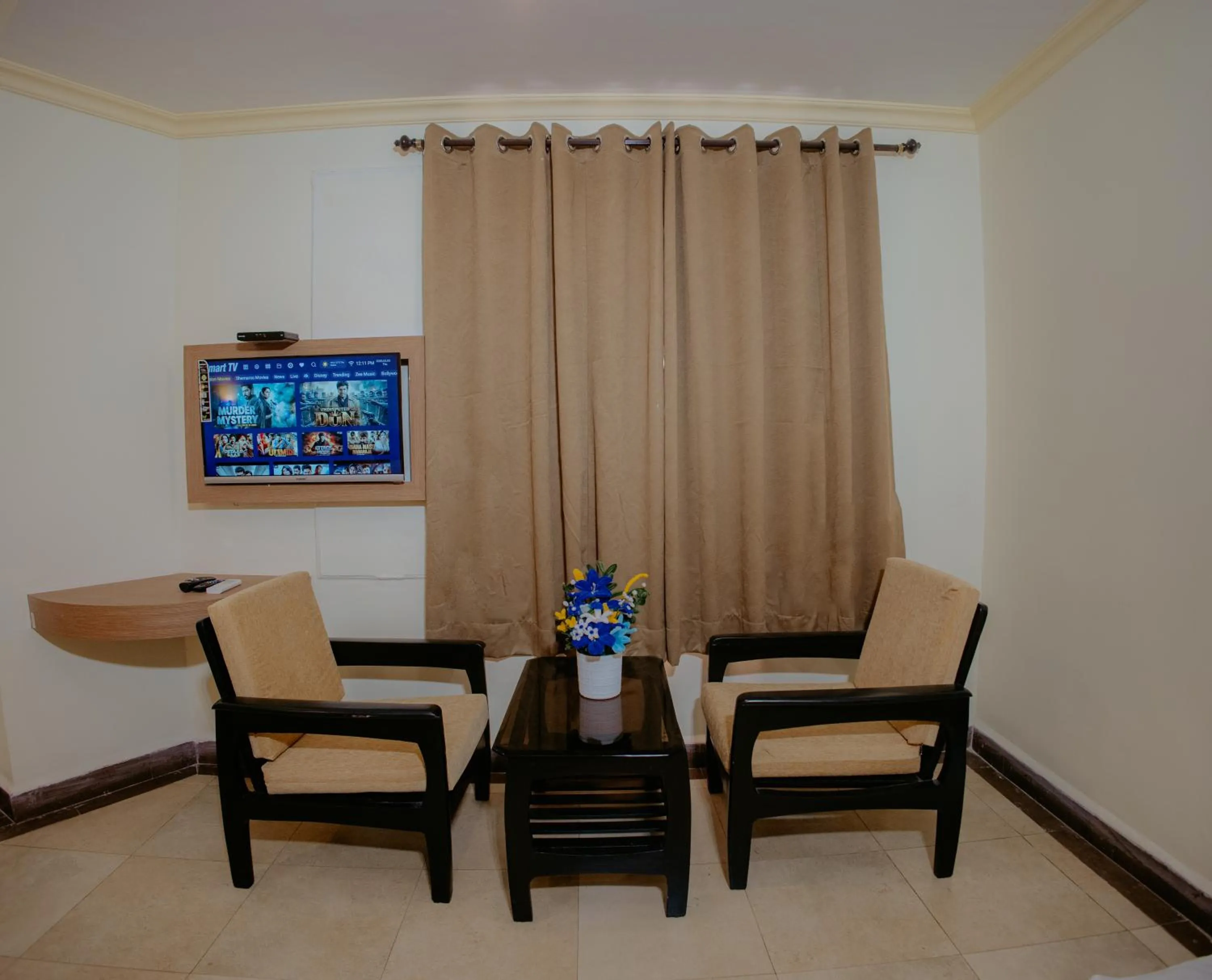 Seating area in Om Shiv Hotel