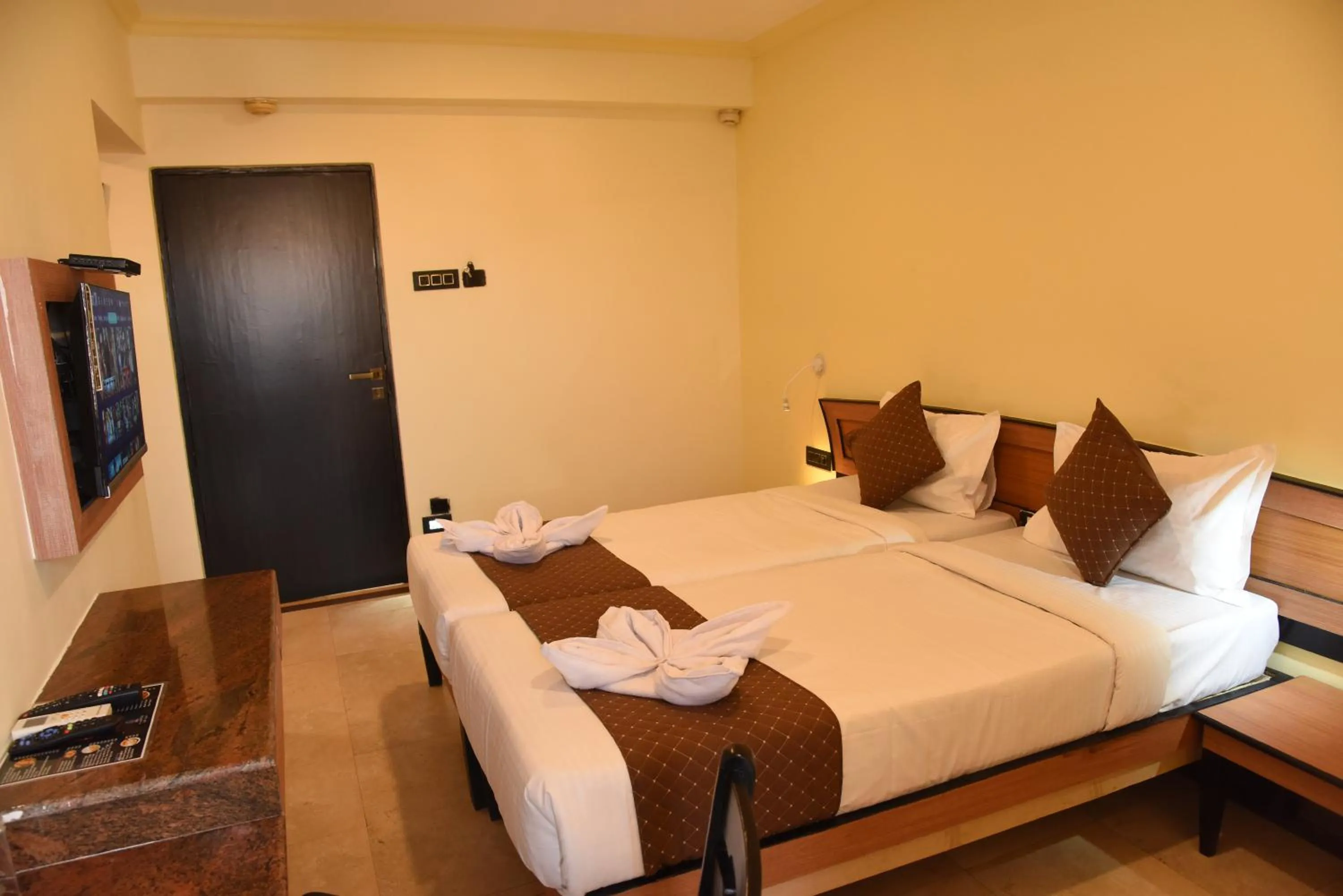 Bed in Om Shiv Hotel