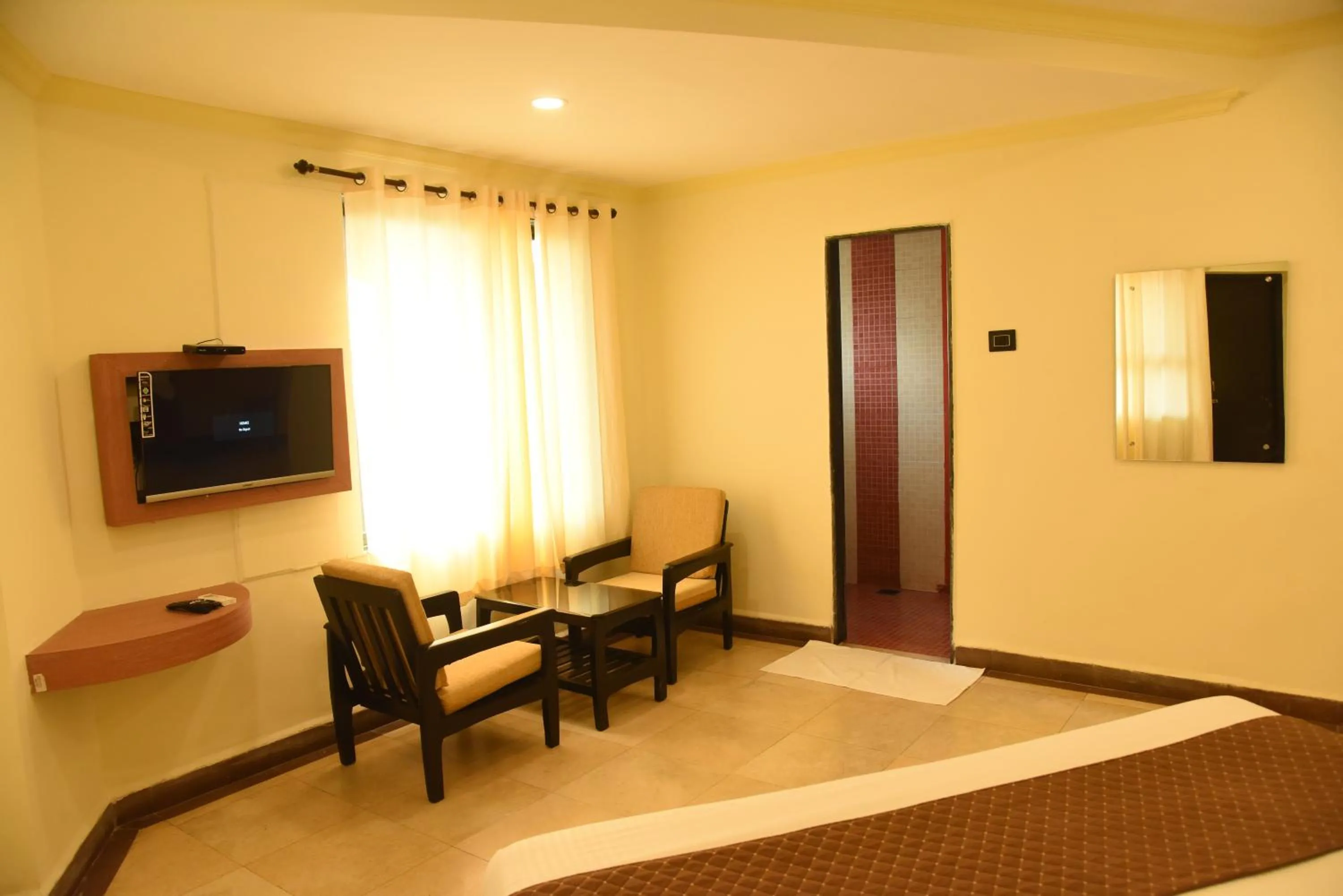 TV and multimedia, Bed in Om Shiv Hotel