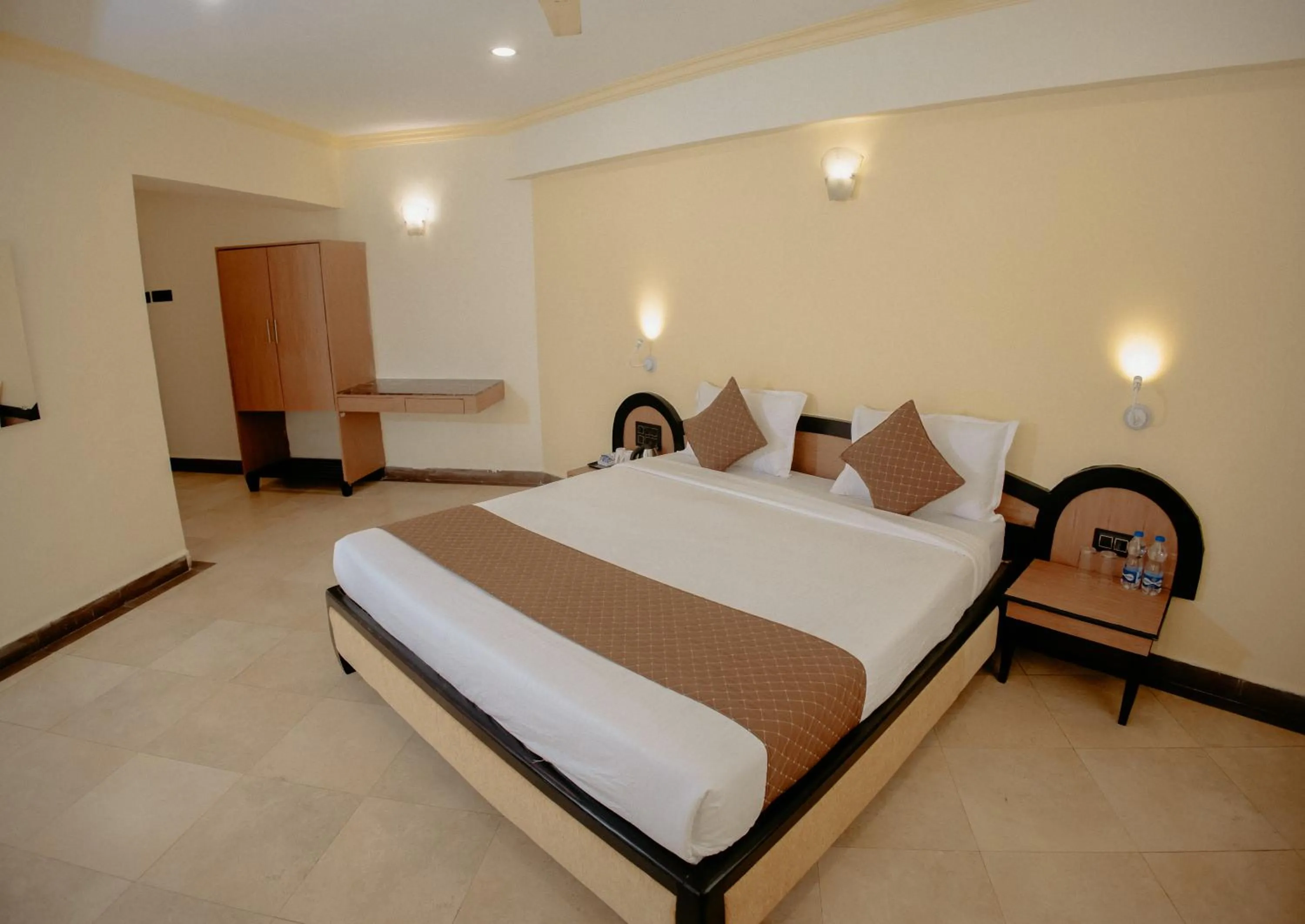 Bed in Om Shiv Hotel