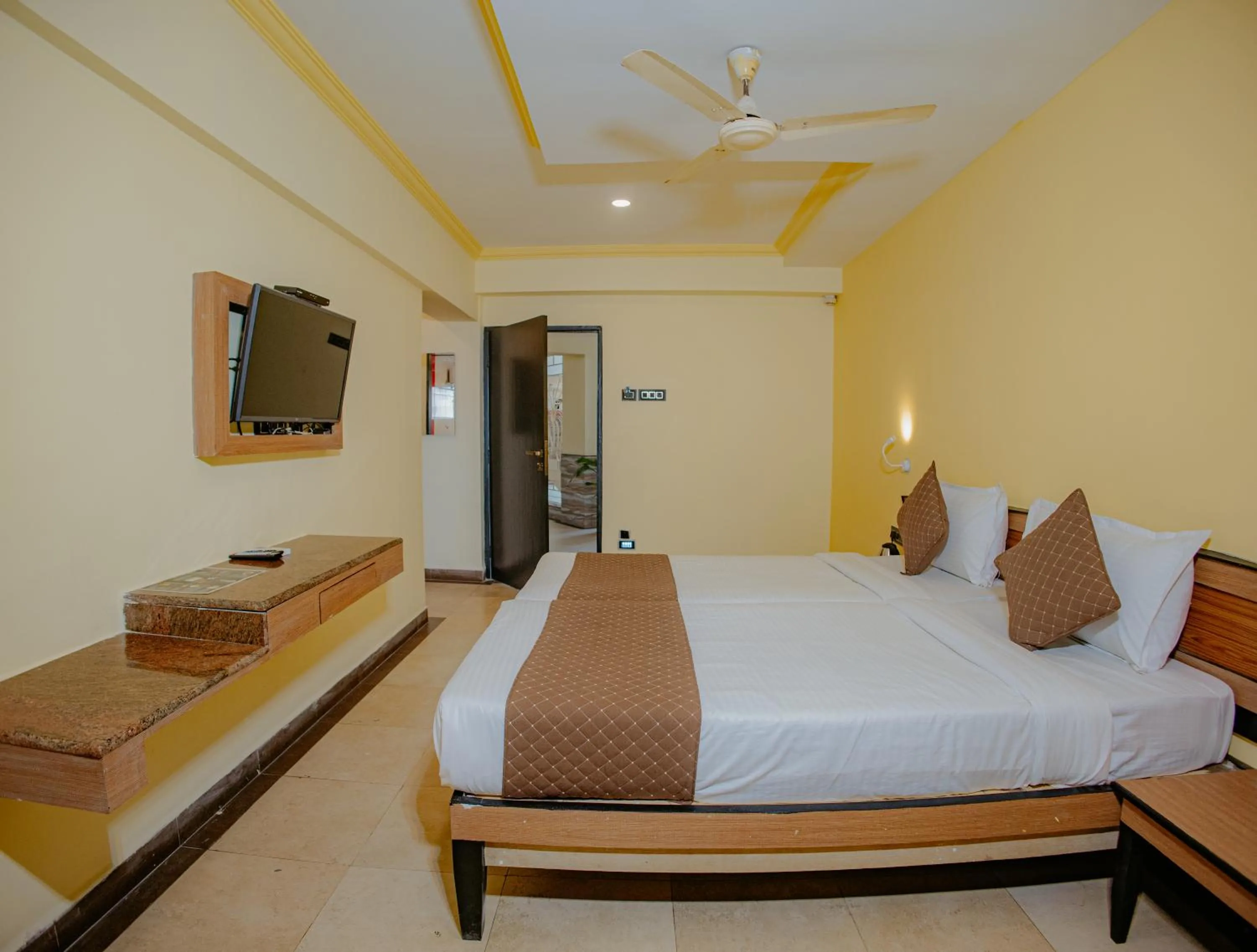 Bed in Om Shiv Hotel