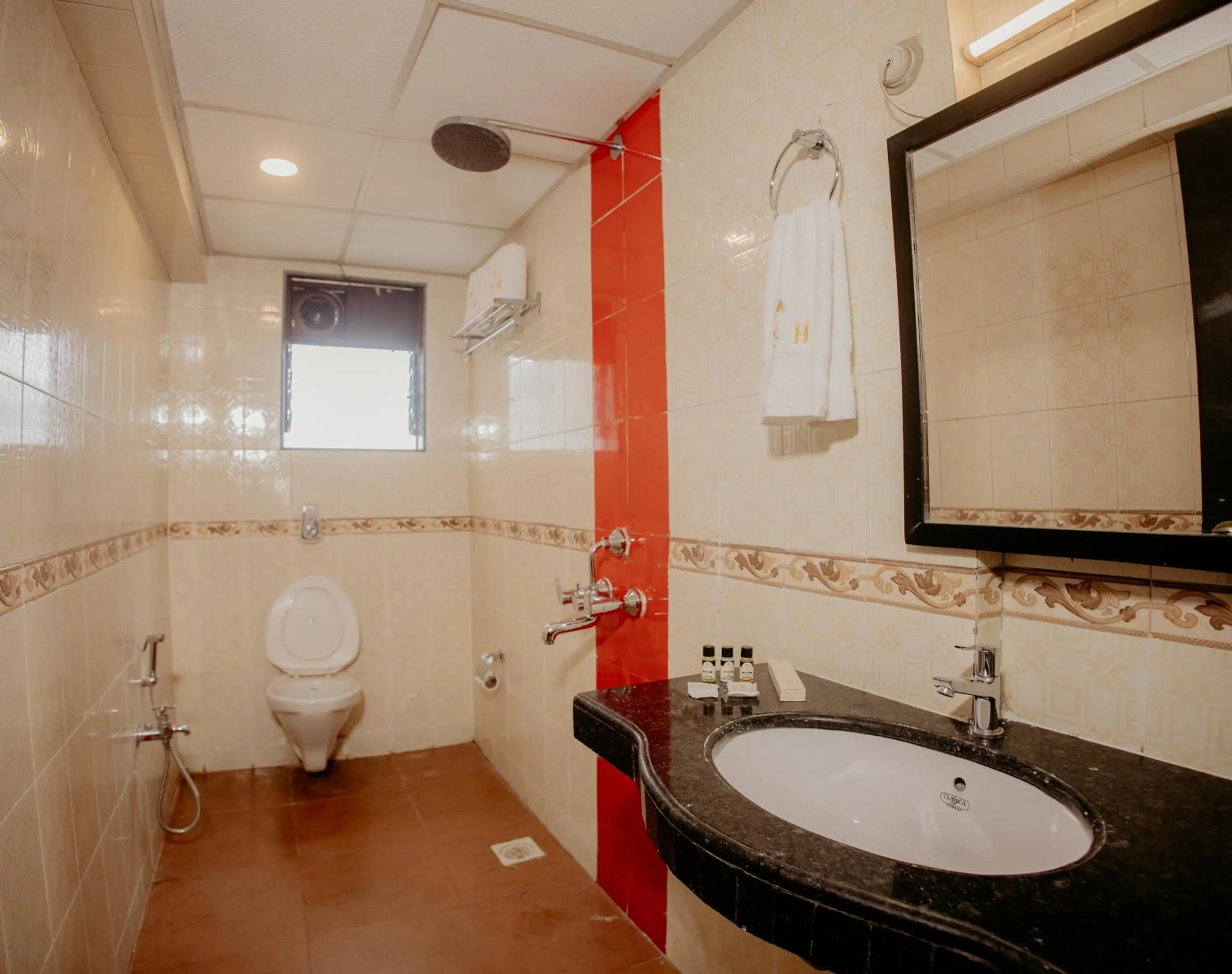 Bathroom in Om Shiv Hotel