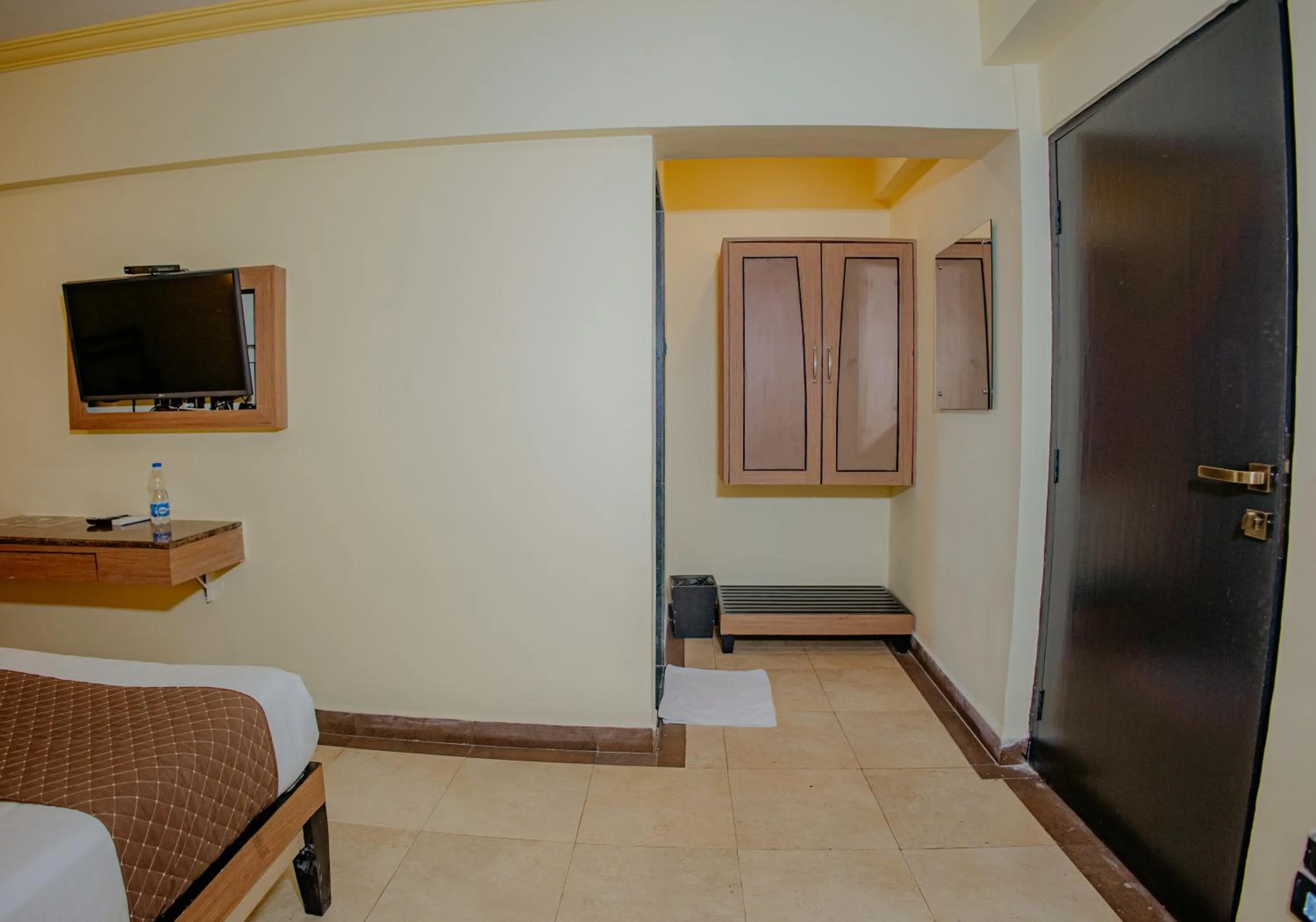 Bed in Om Shiv Hotel