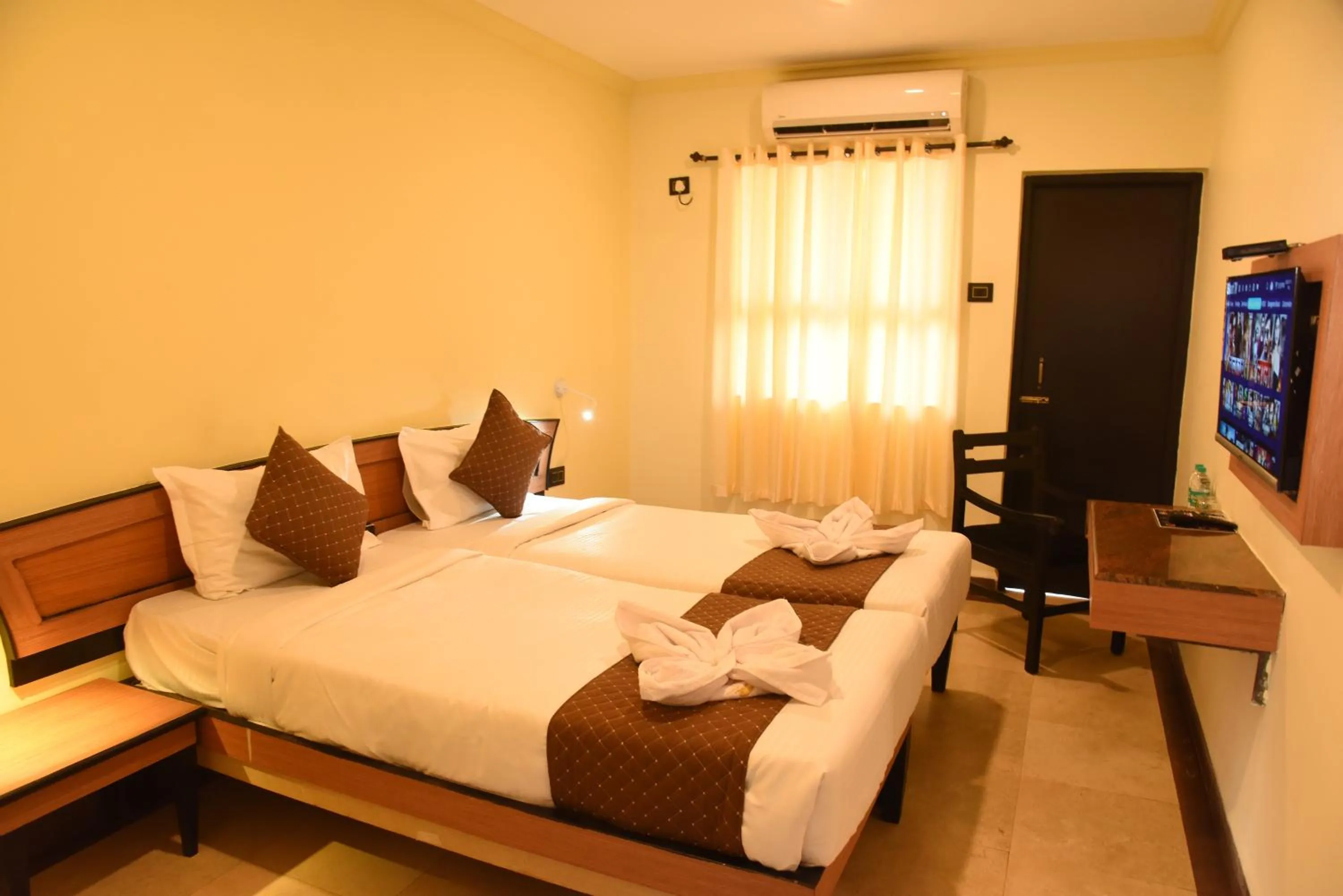 Bed in Om Shiv Hotel