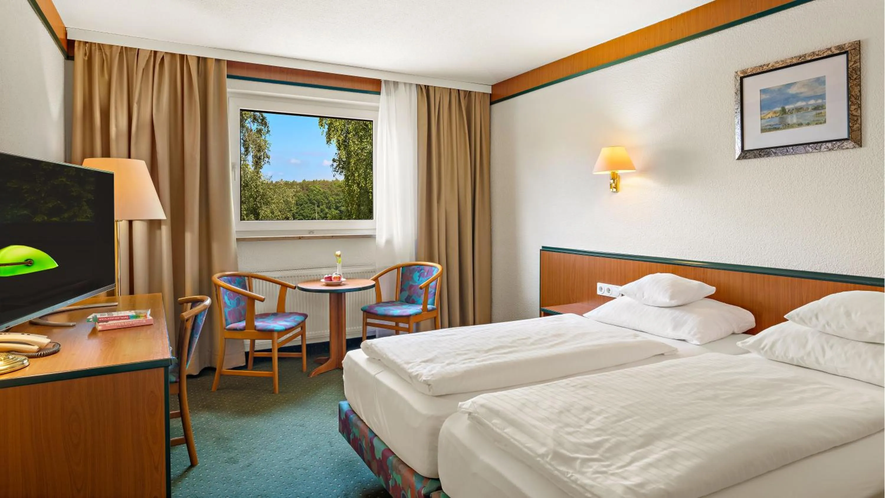 Photo of the whole room, Bed in Seehotel Mühlenhaus