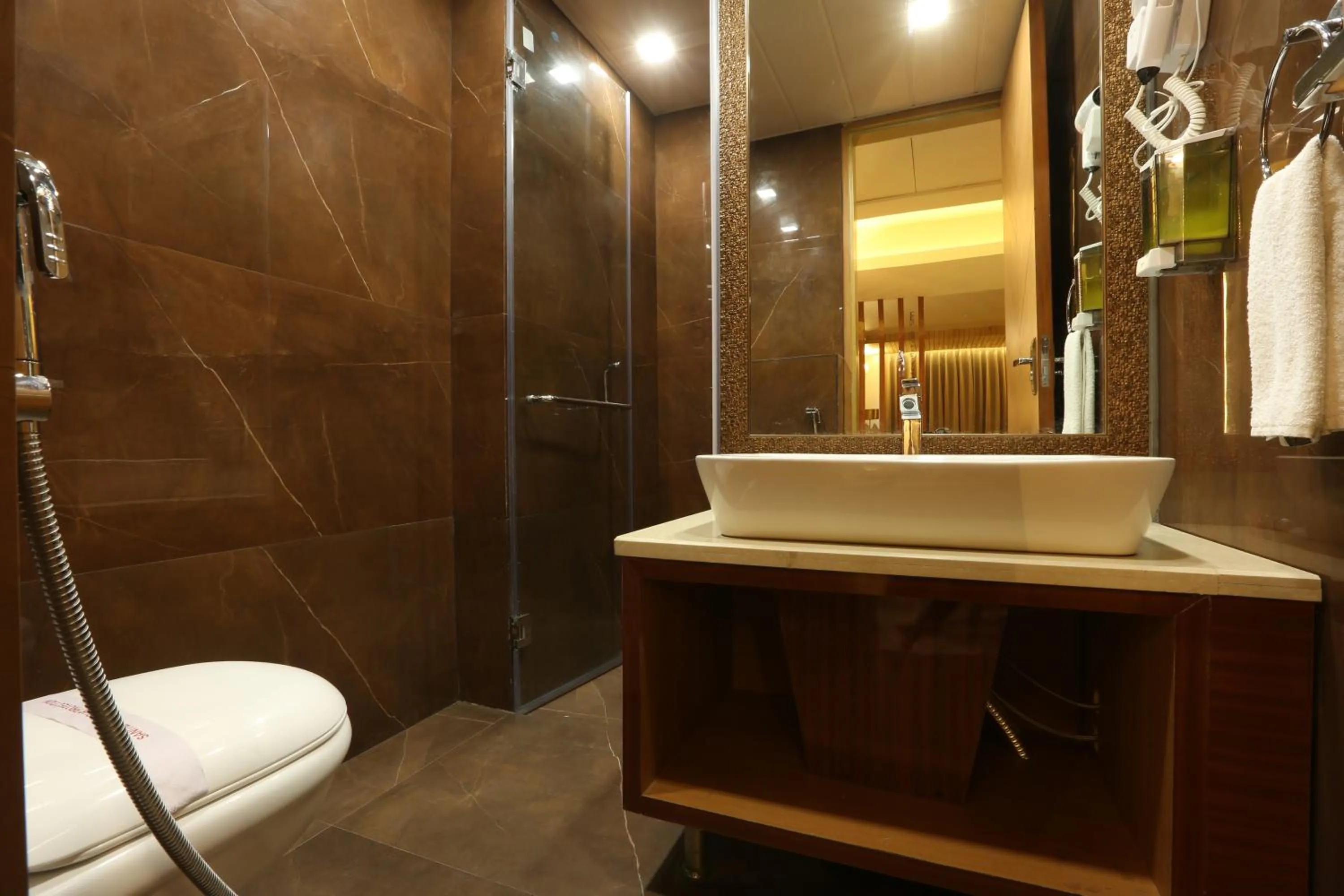 Bathroom in Hotel Omega - Gurgaon Central, Sec 45