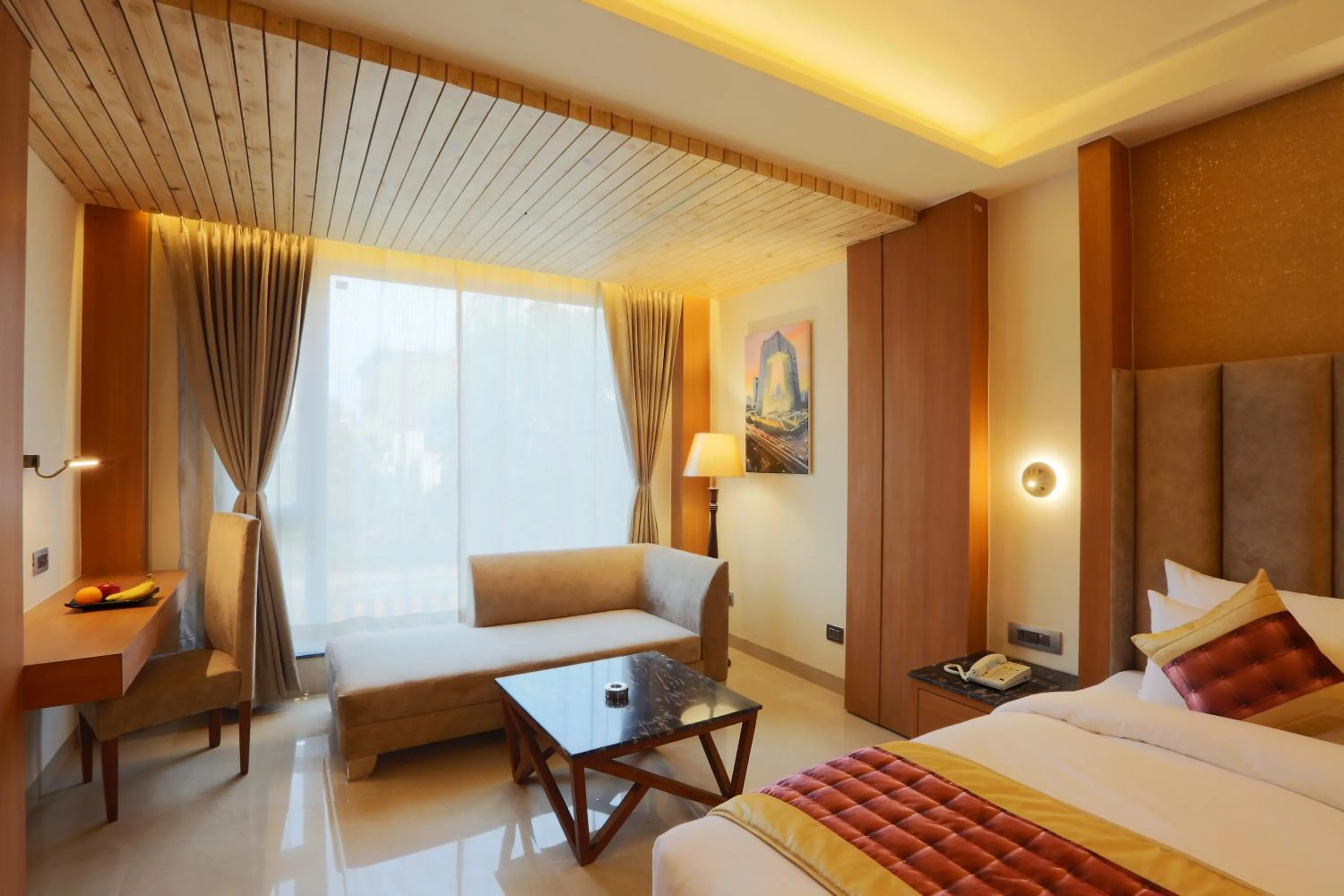 Seating area, Bed in Hotel Omega - Gurgaon Central, Sec 45