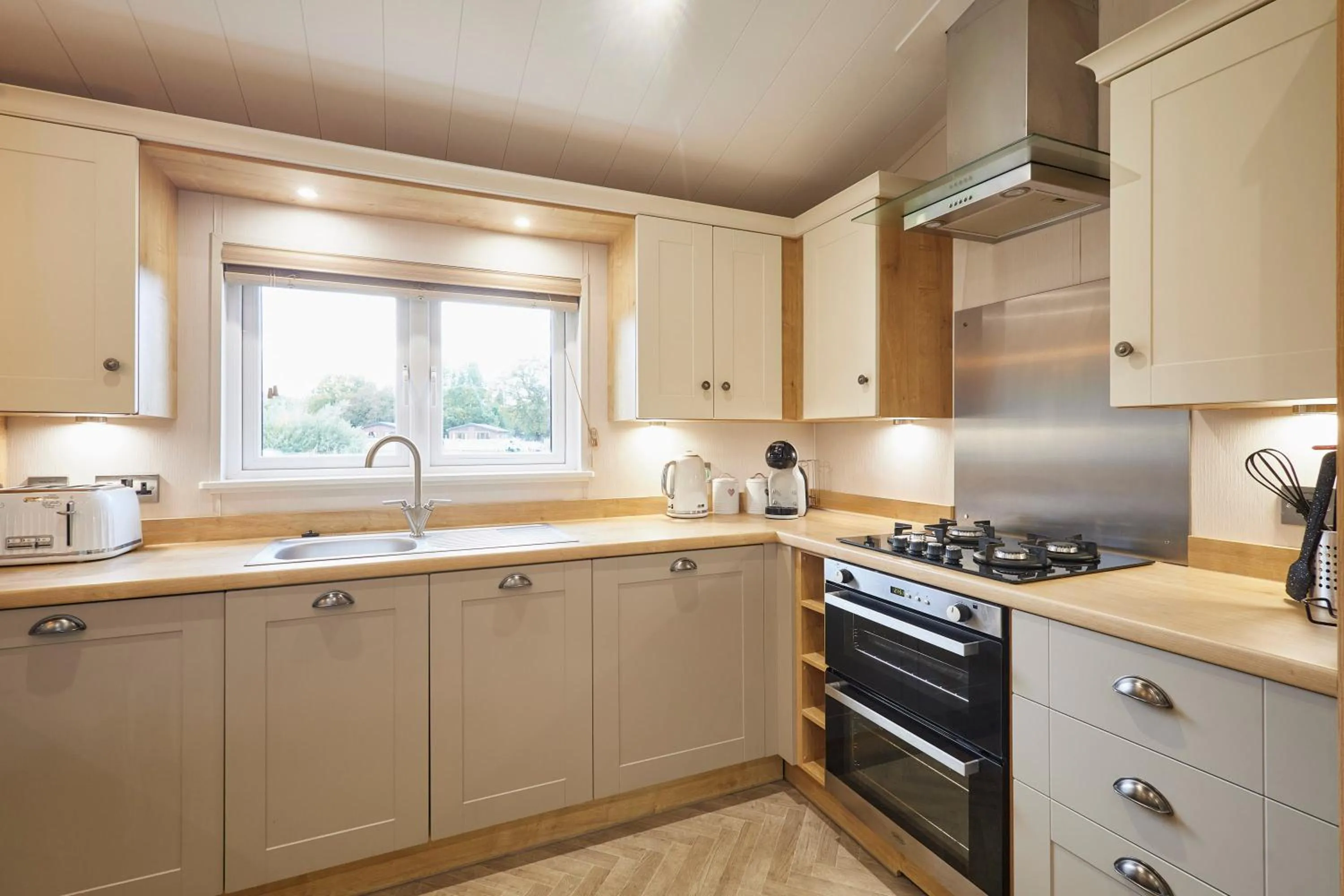 Kitchen or kitchenette in Kinship Lodge with Hot Tub