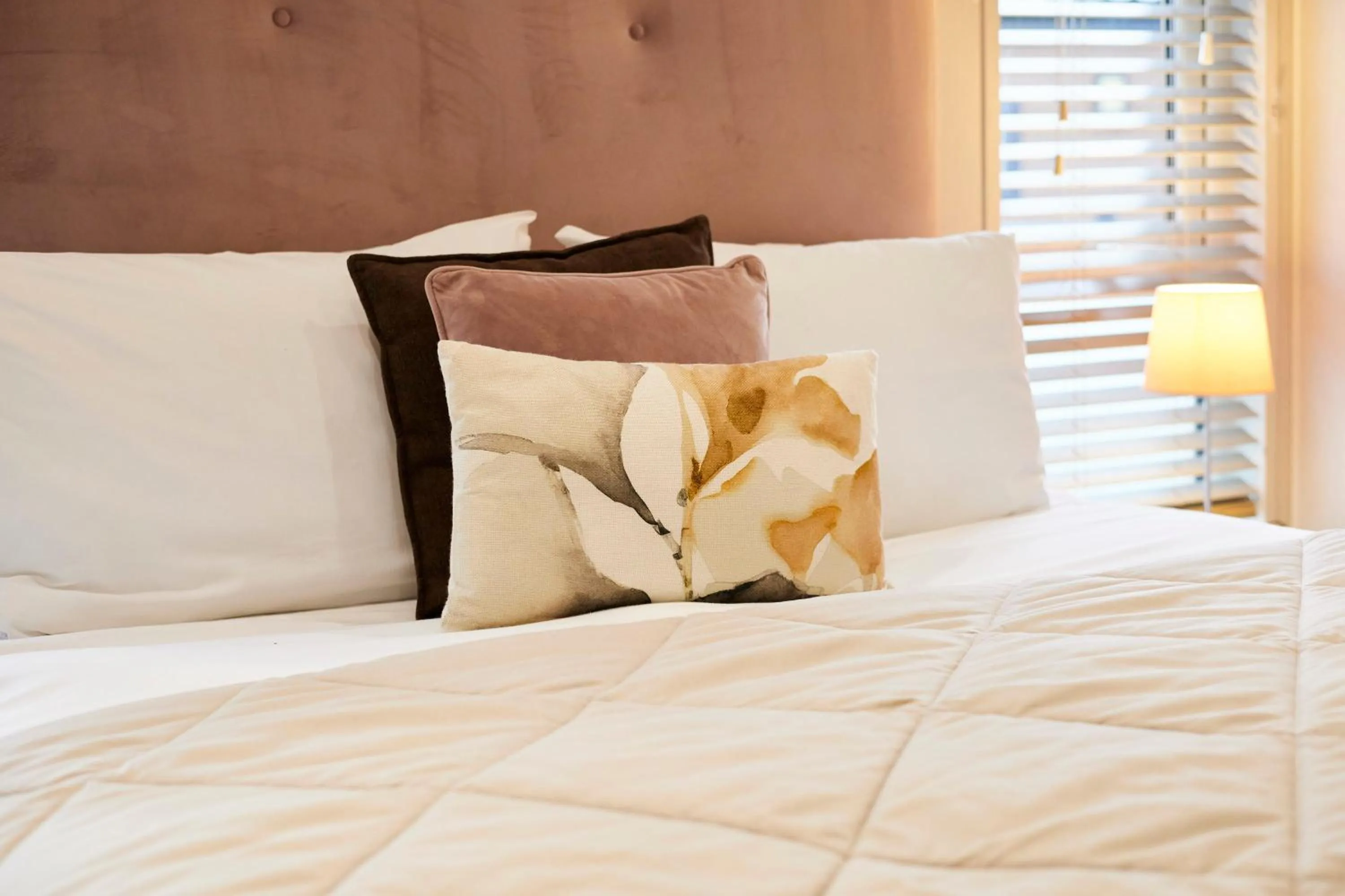 Bed in Kinship Lodge with Hot Tub