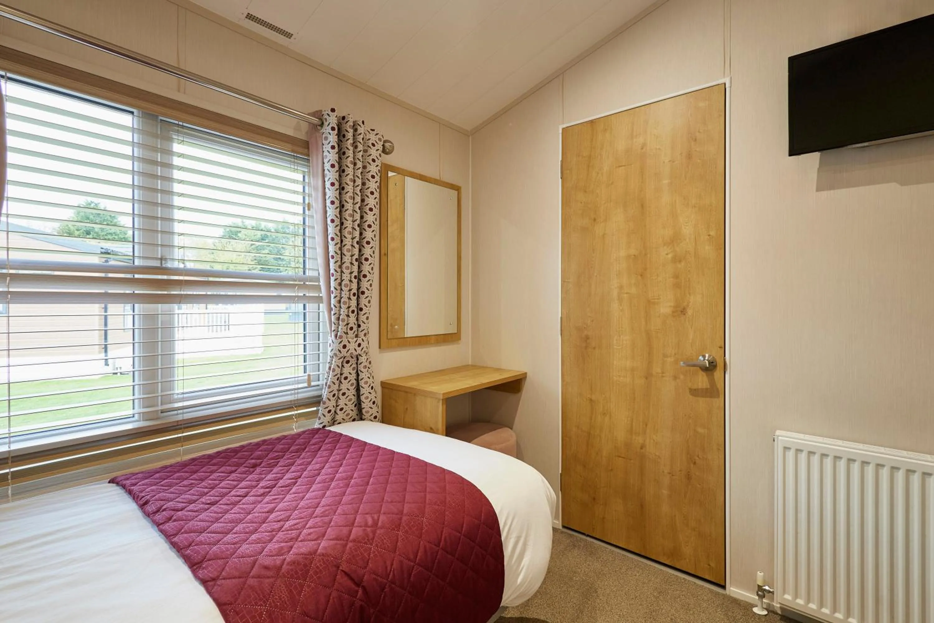 Bed in Kinship Lodge with Hot Tub