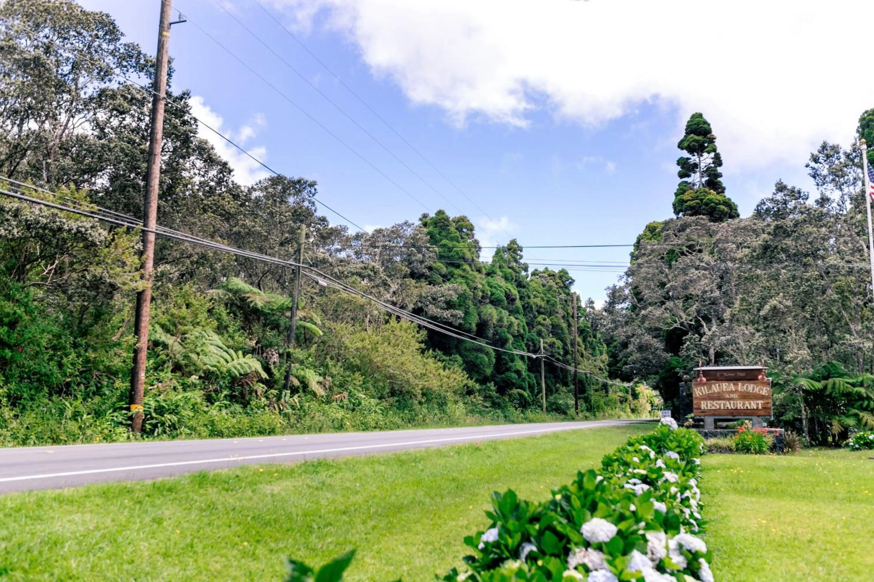 Property logo or sign in Kilauea Lodge and Restaurant