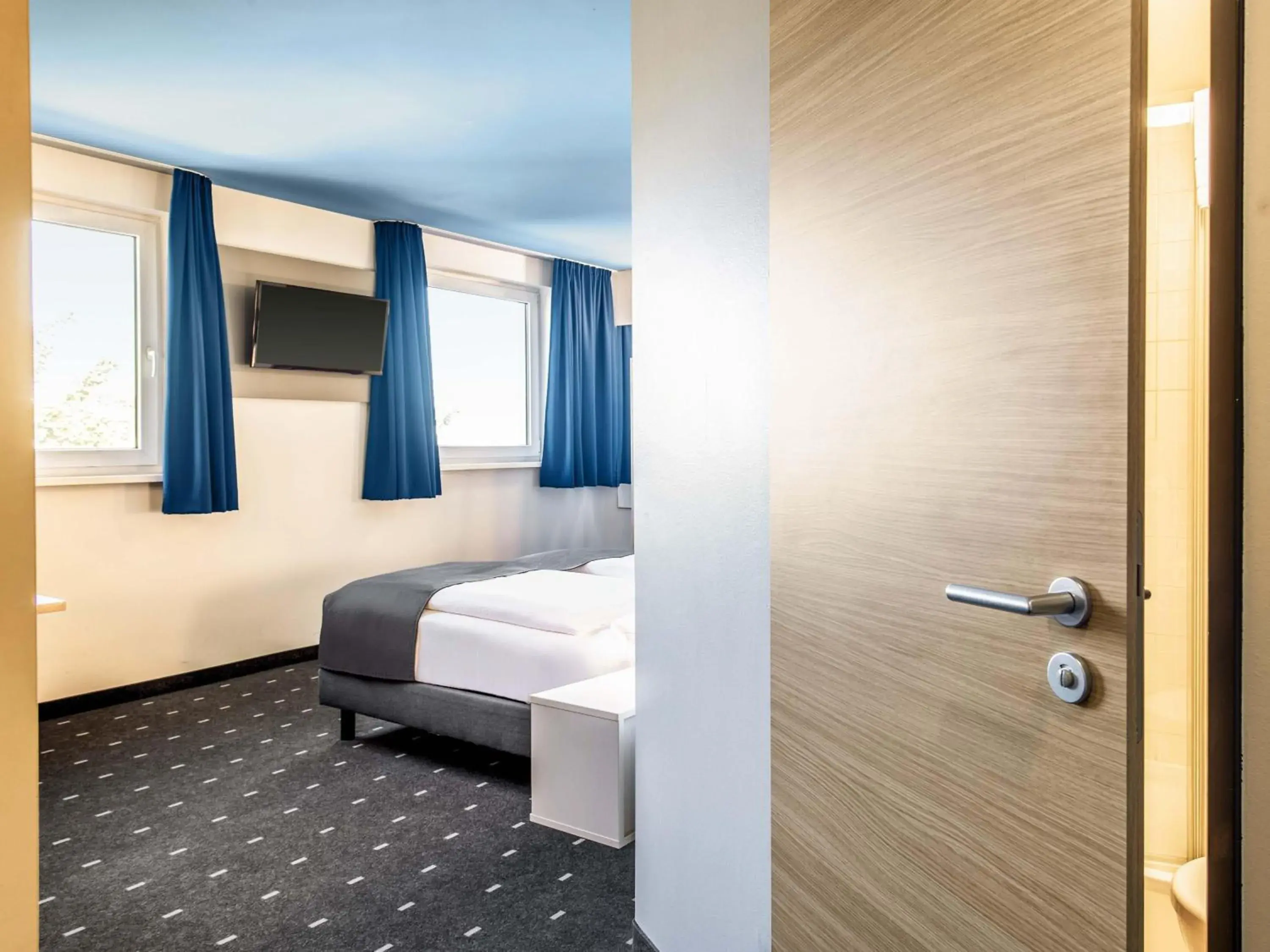 Photo of the whole room, Bed in B&B Hotel München City-Nord Photo of the whole room, Bed in B&B Hotel München City-Nord