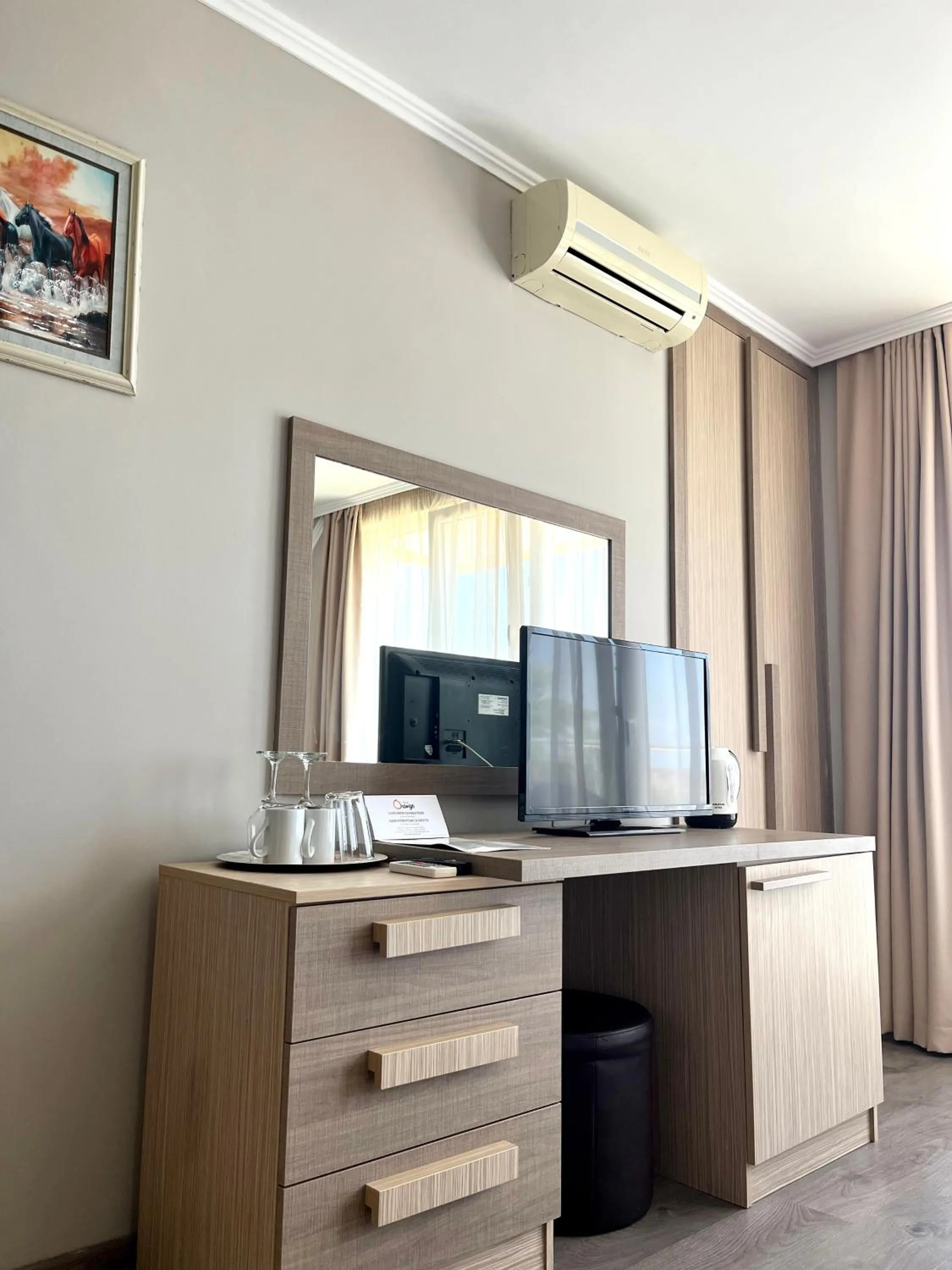 Communal lounge/ TV room in Villa Orange