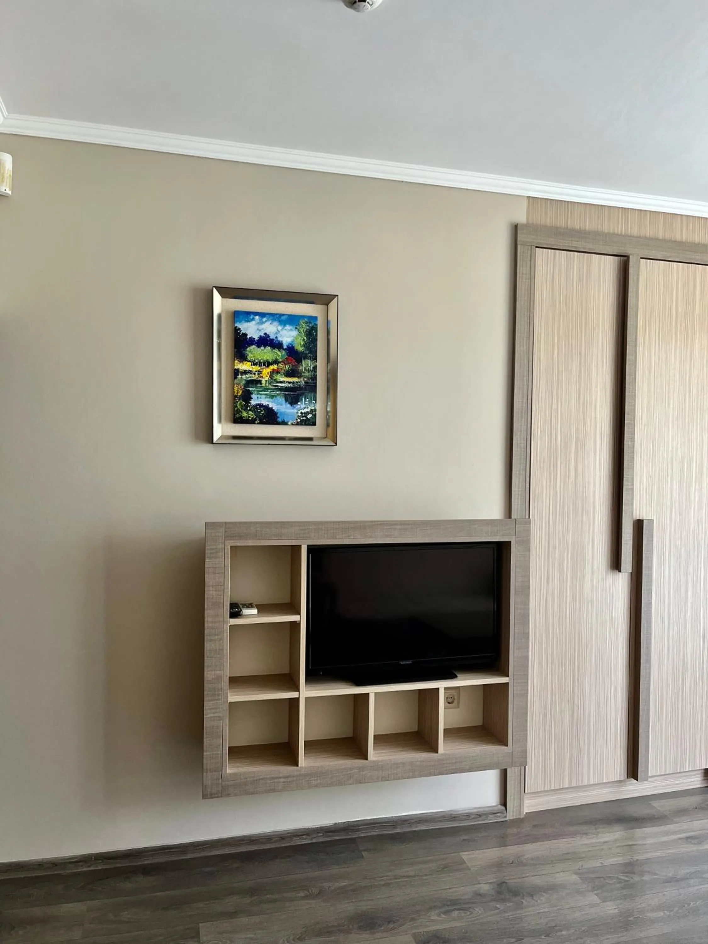 Communal lounge/ TV room in Villa Orange