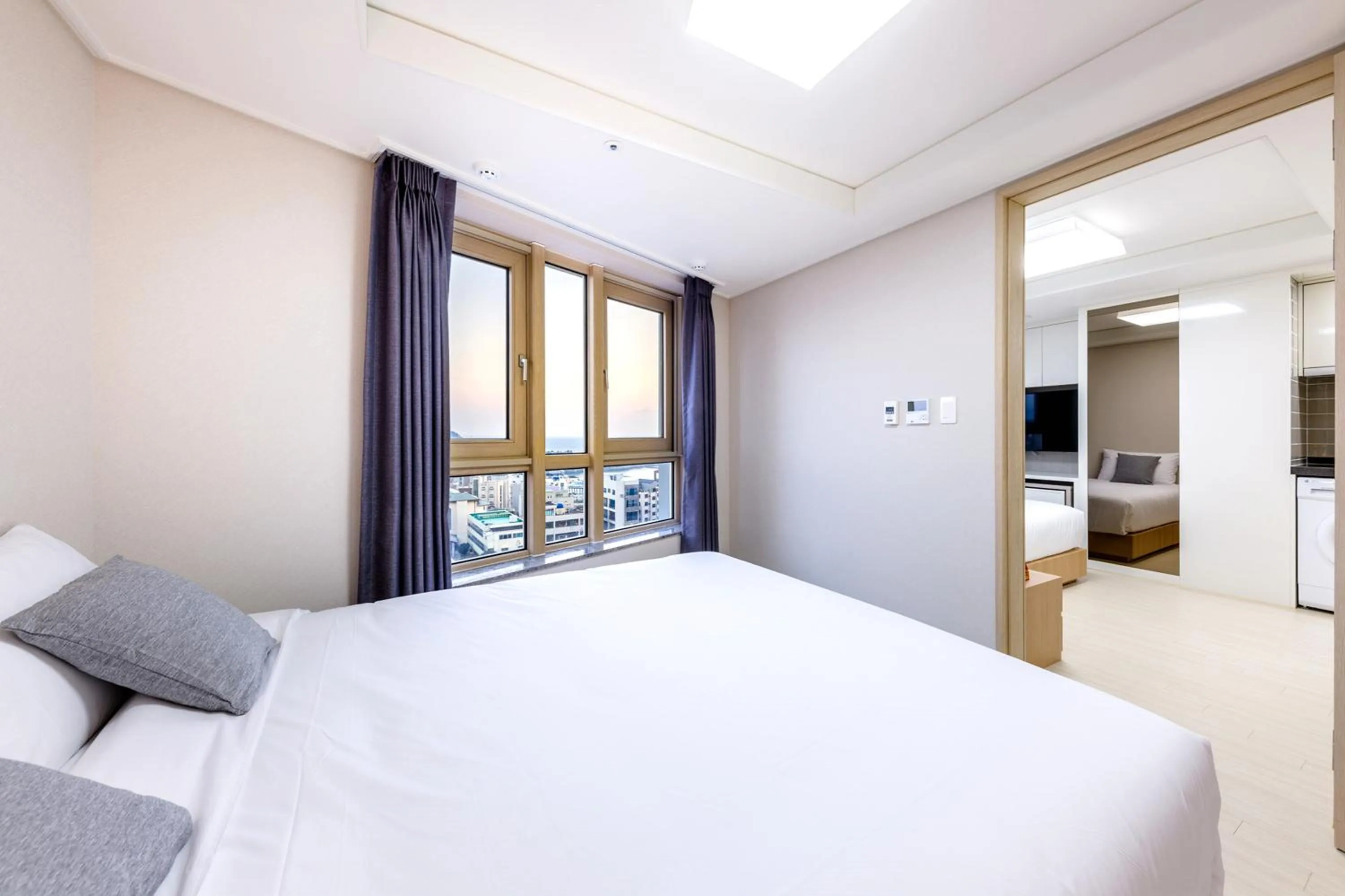 Bed in Shin Shin Hotel Seogwipo