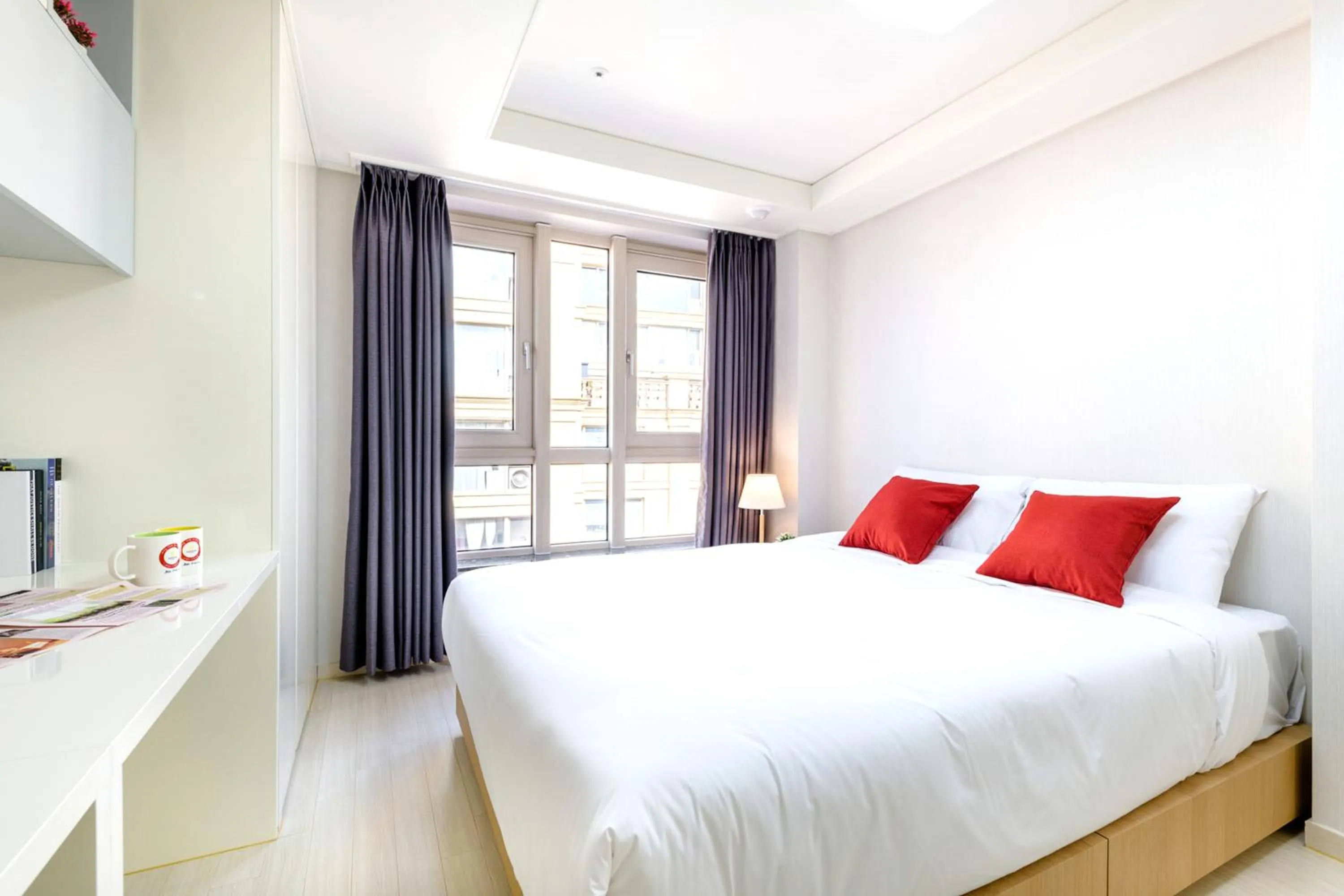 Bed in Shin Shin Hotel Seogwipo