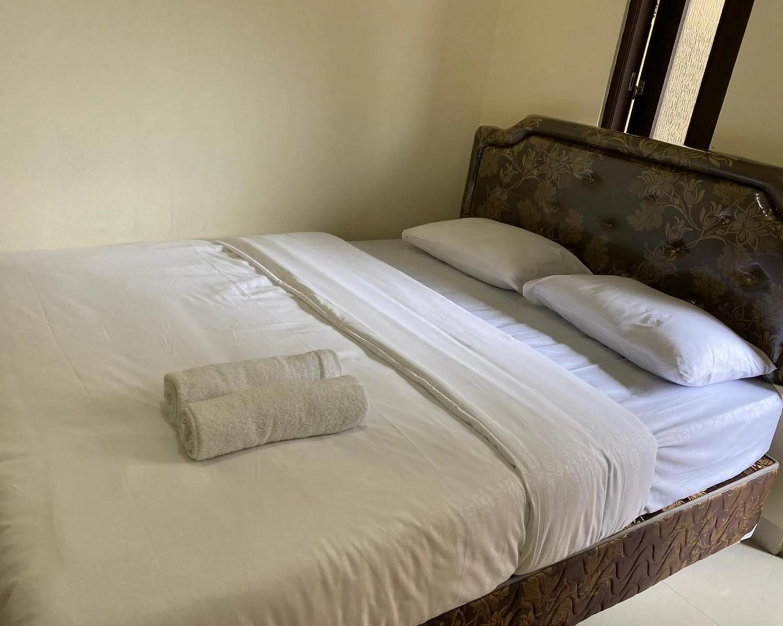 Bed in Jatiwinangun Homestay near GOR Satria Purwoketo Mitra RedDoorz