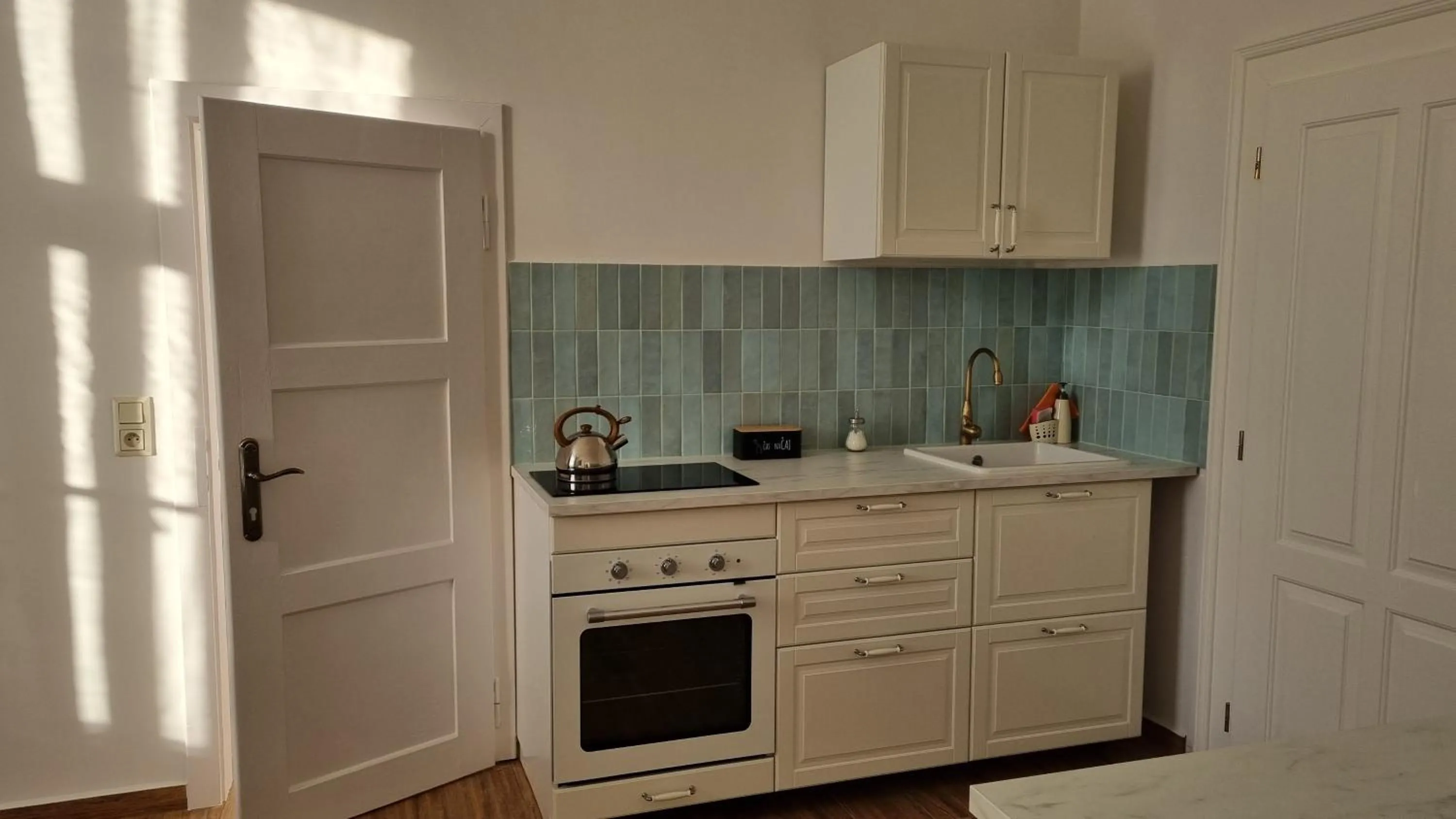 Kitchen or kitchenette in Pension Zámek Rudník