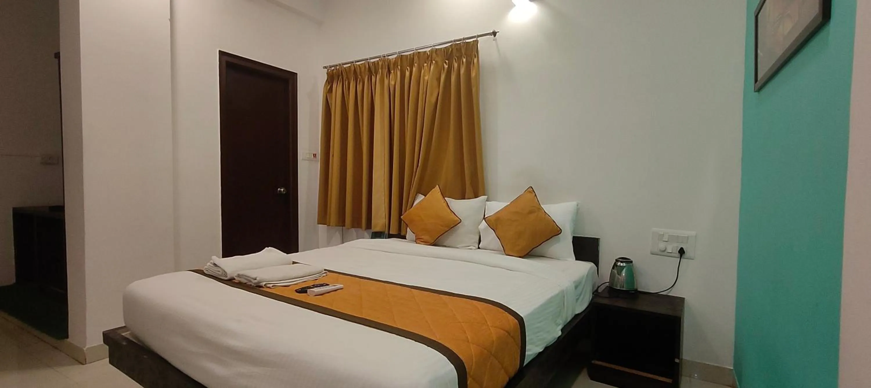 Bed in Hotel Dhruv Palace Bangalore Jakkur