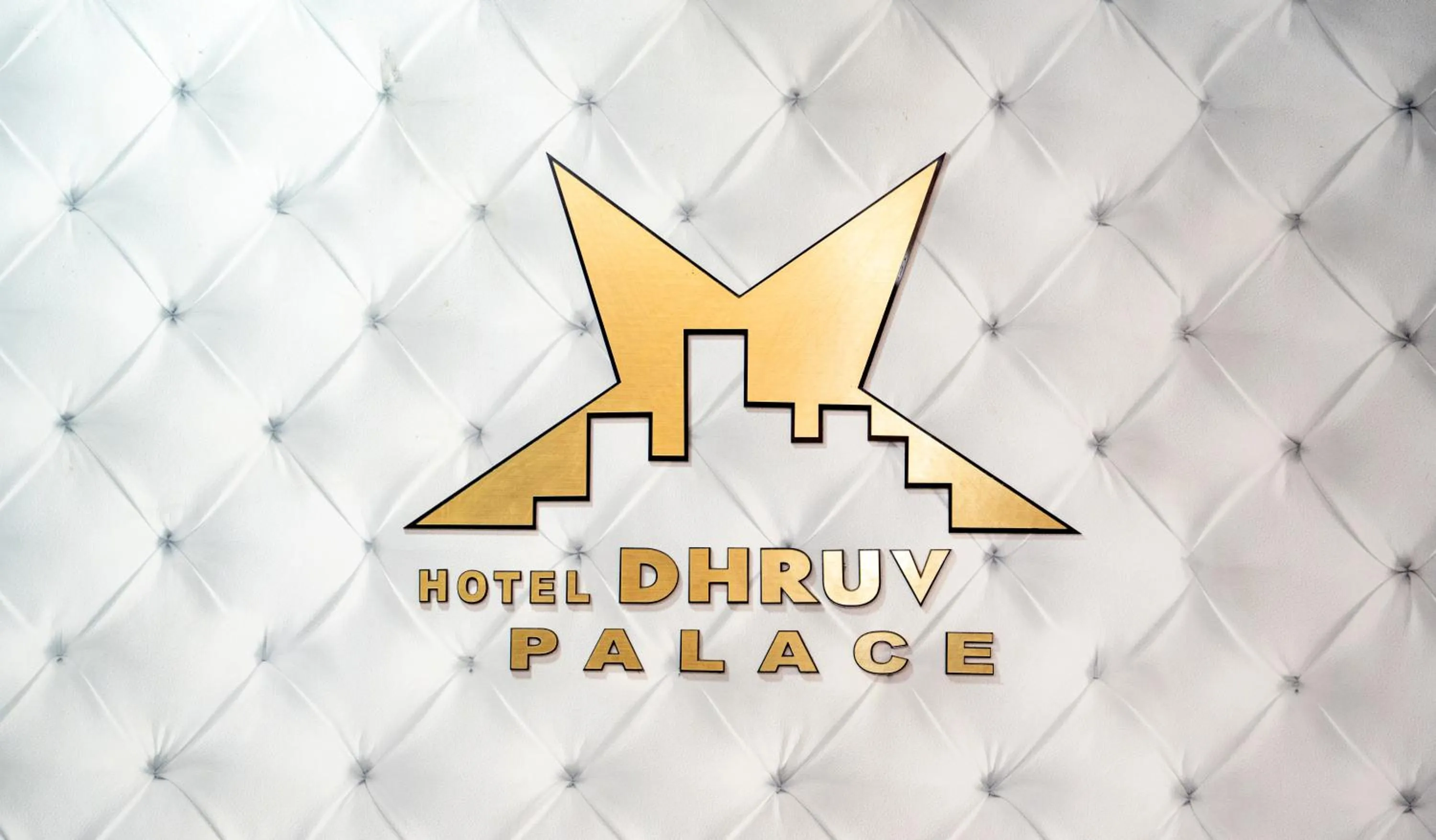 Property logo or sign in Hotel Dhruv Palace Bangalore Jakkur