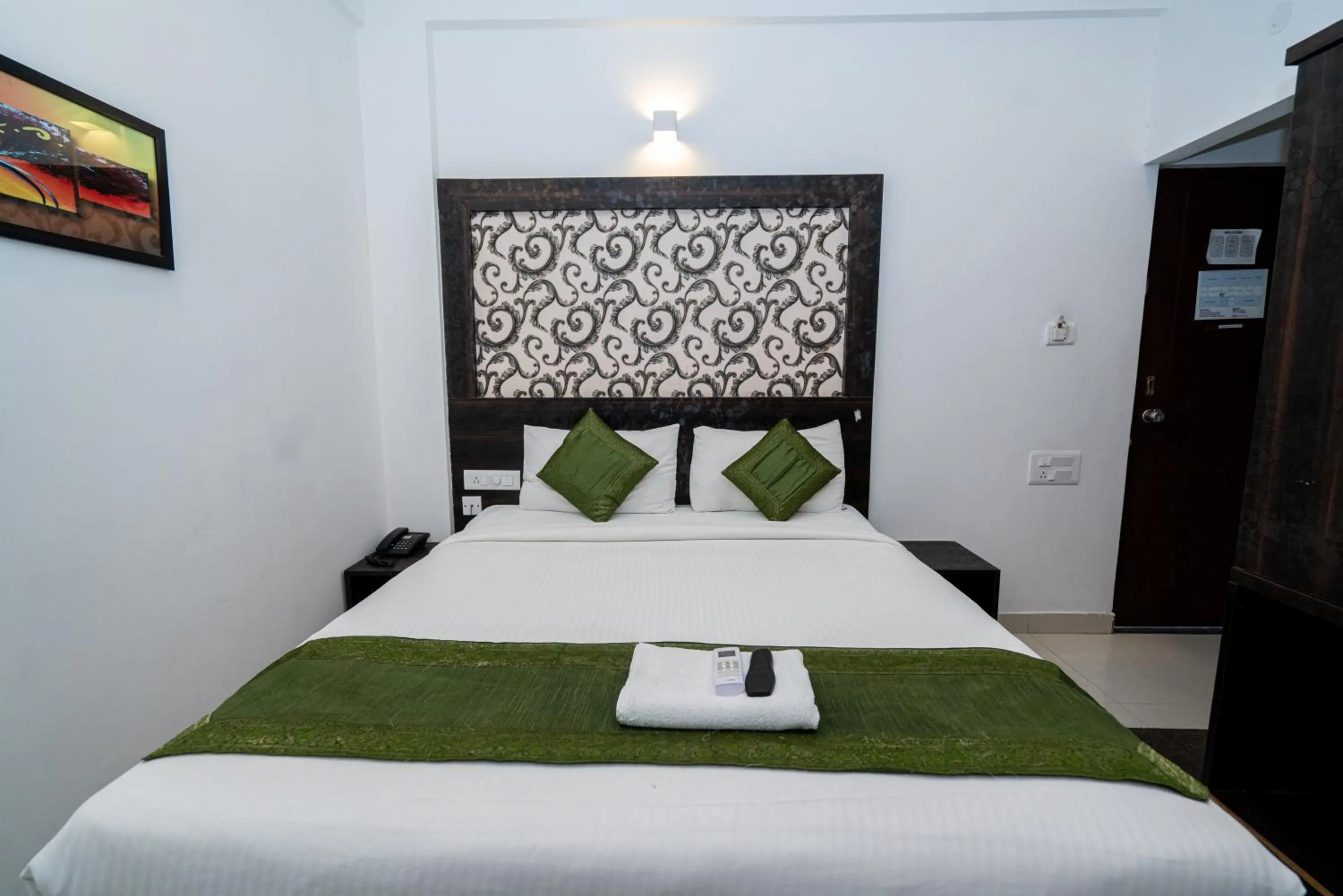 Bed in Hotel Dhruv Palace Bangalore Jakkur