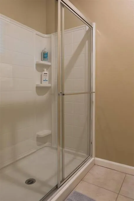 Gated townhouse with 2 suites, heated pool, hot tub