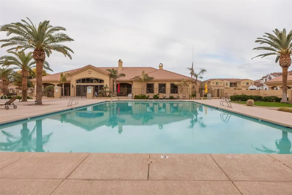 Gated townhouse with 2 suites, heated pool, hot tub