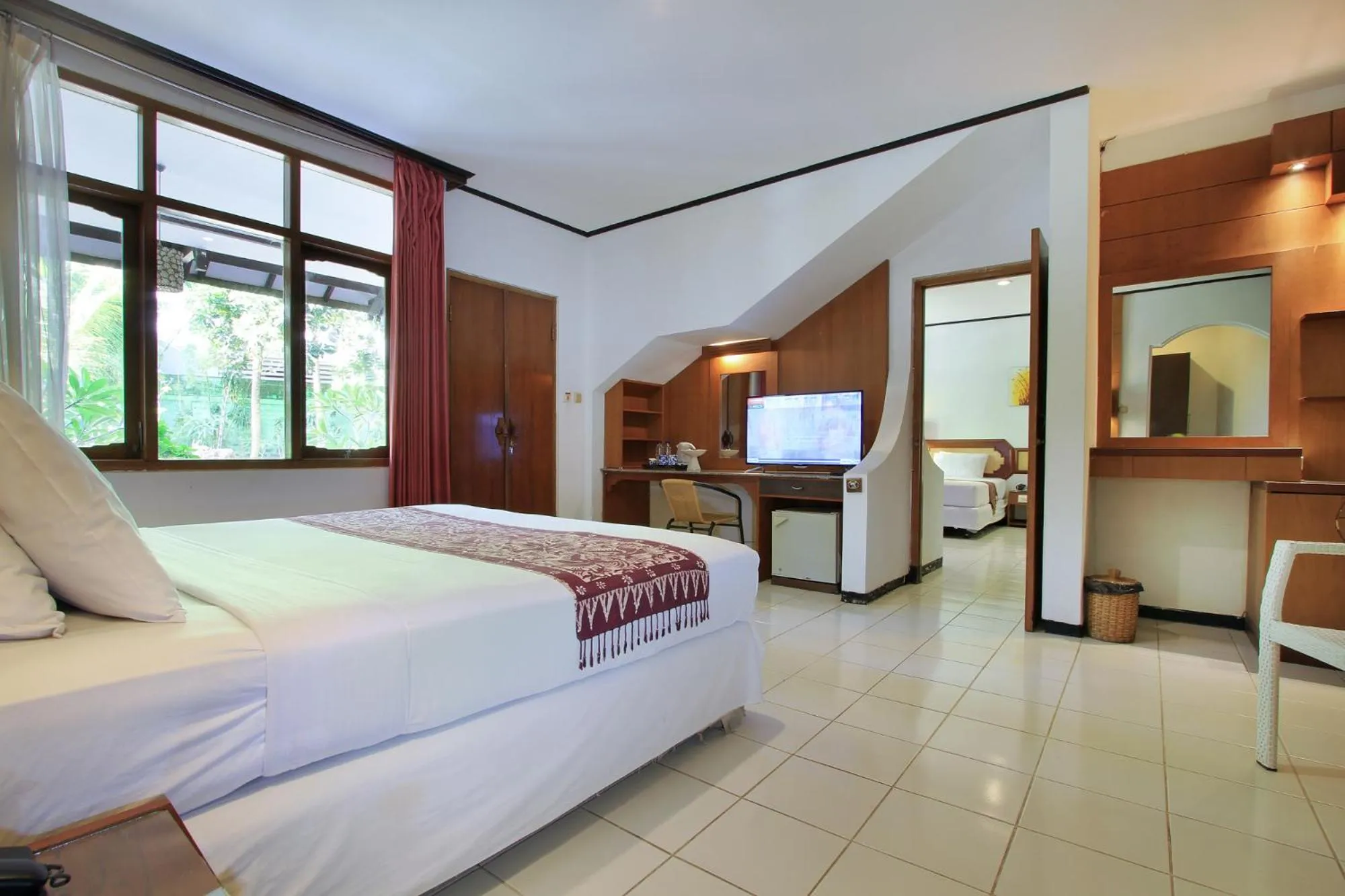 Bedroom, Bed in Puri Naga Beachfront Cottages