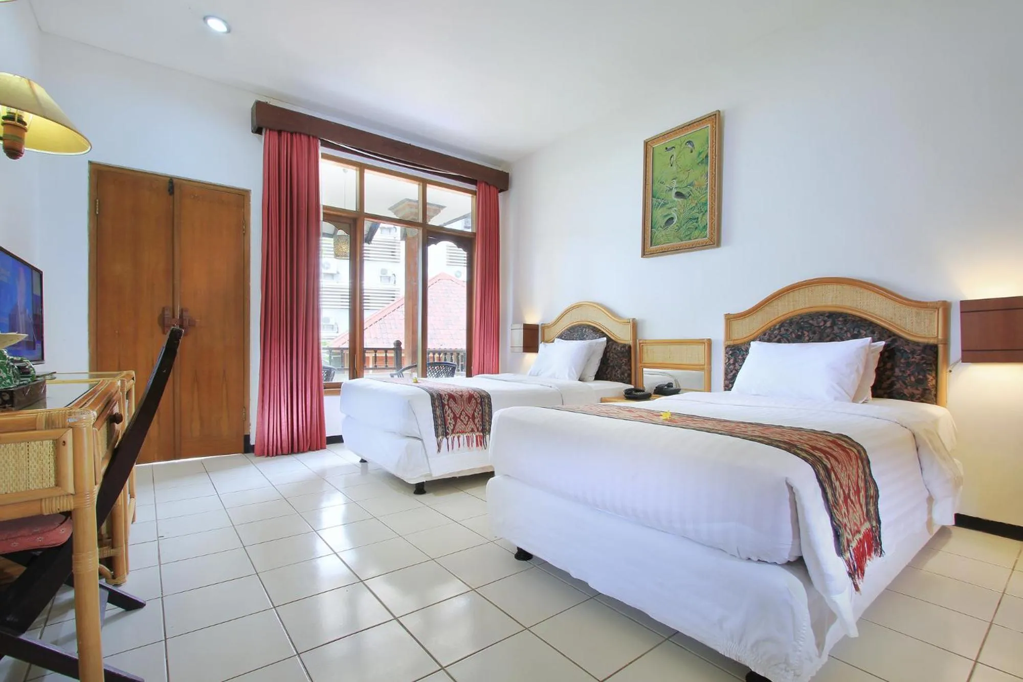 Patio, Bed in Puri Naga Beachfront Cottages