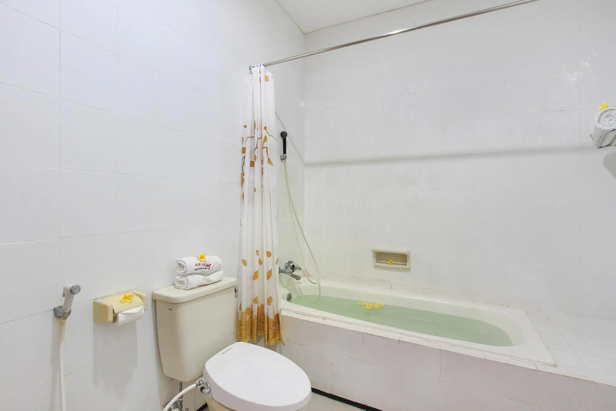 Shower in Puri Naga Beachfront Cottages