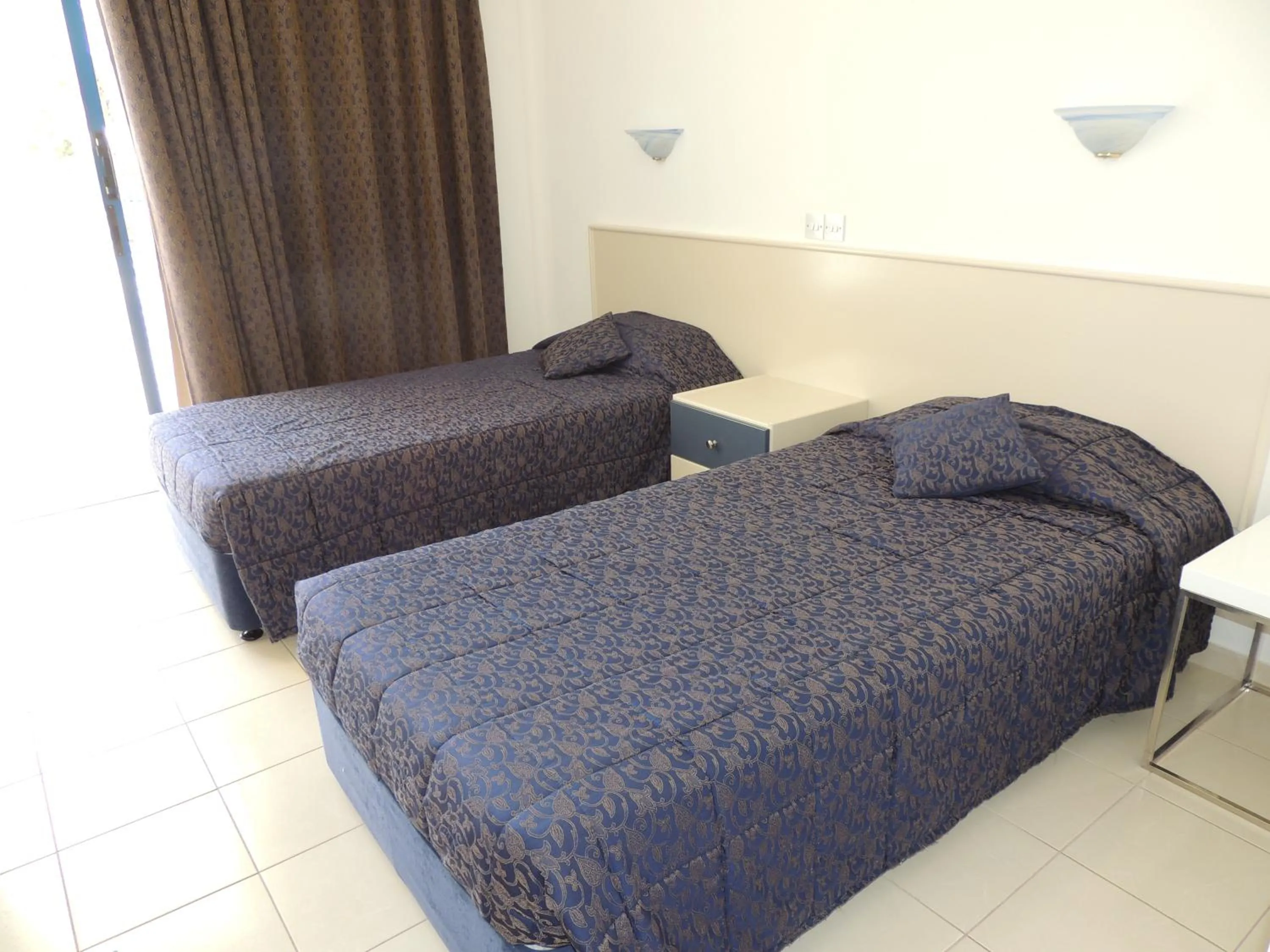 Photo of the whole room, Bed in West End Hotel