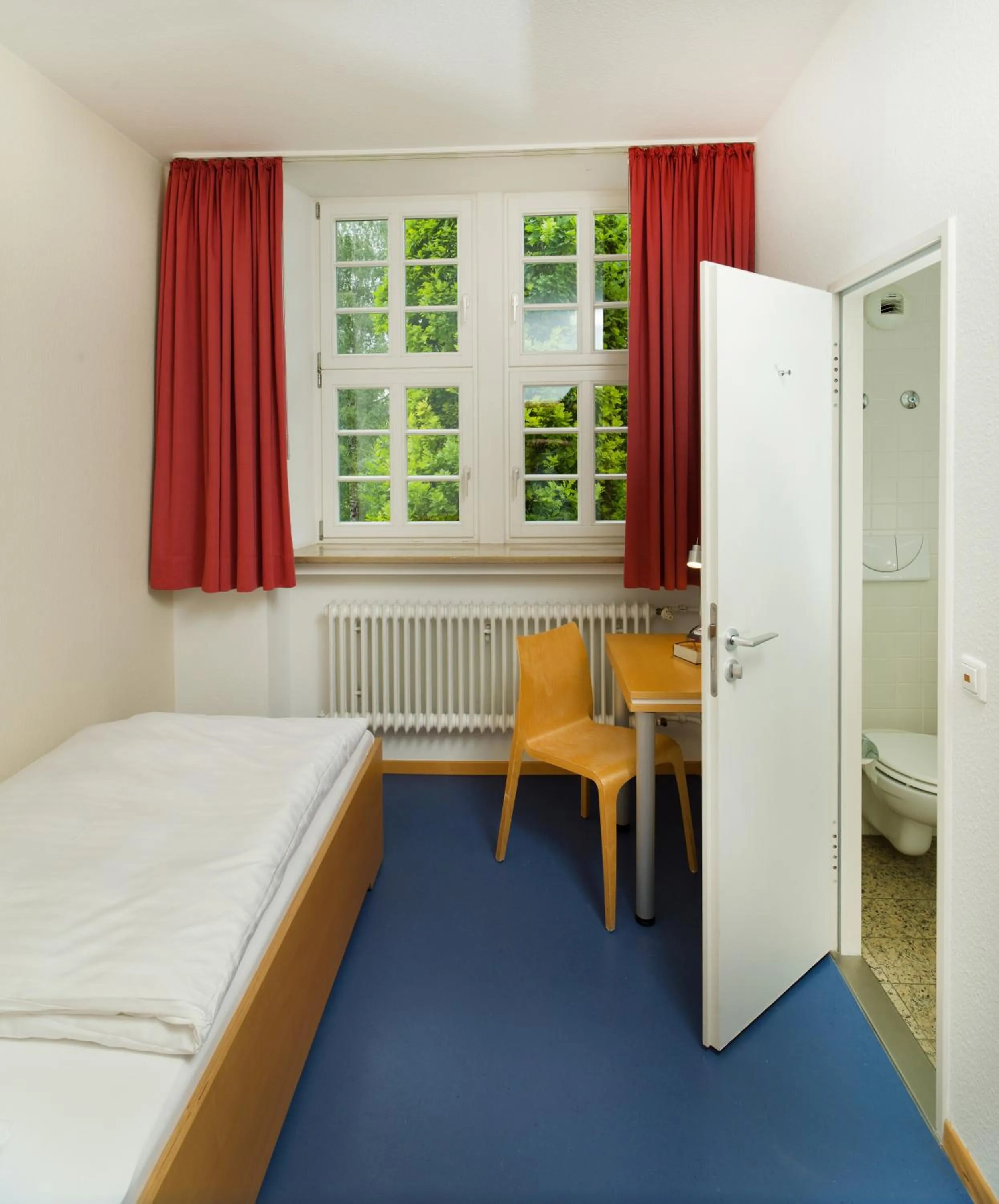 Photo of the whole room, Bed in Bildungshaus Neckarelz