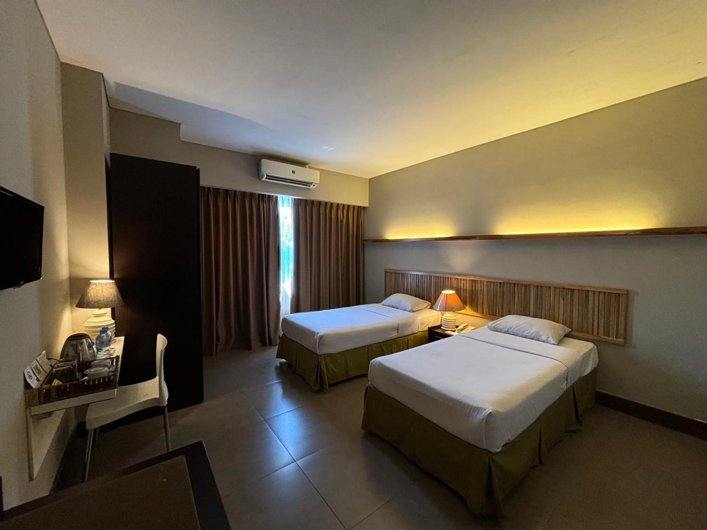 Bed in Bali World Hotel