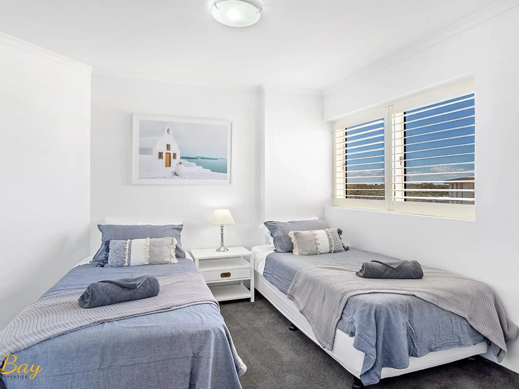 Bedroom, Bed in Breakwater Apartment 402
