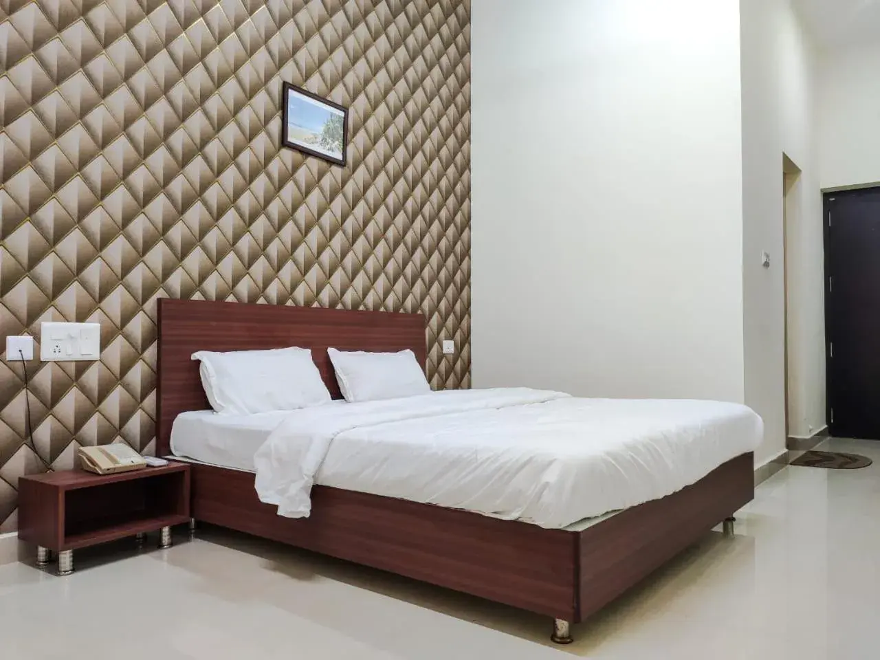 Bed in Fortune Village Hotel Bed in Fortune Village Hotel