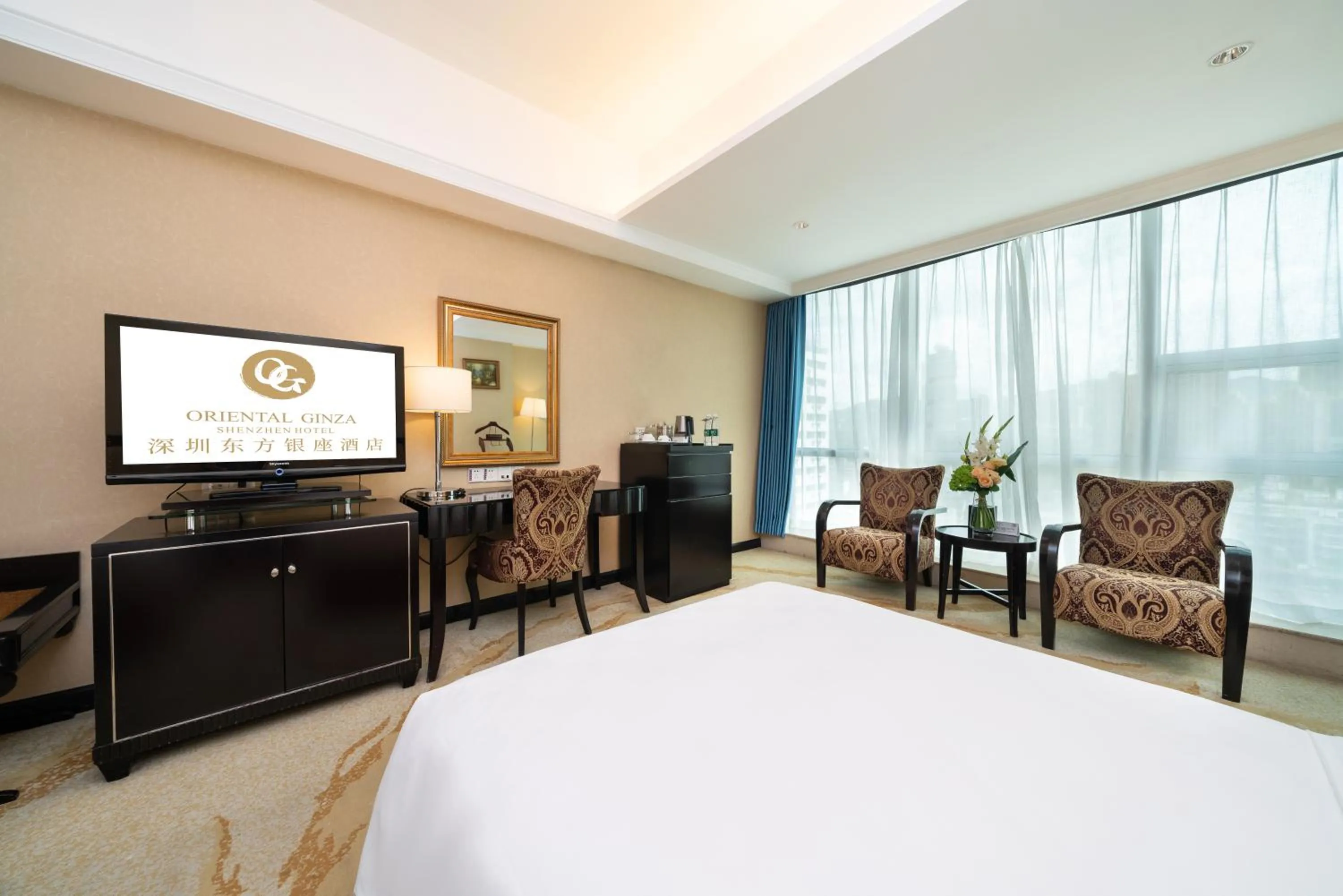 Bed in Oriental Ginza Hotel Shenzhen