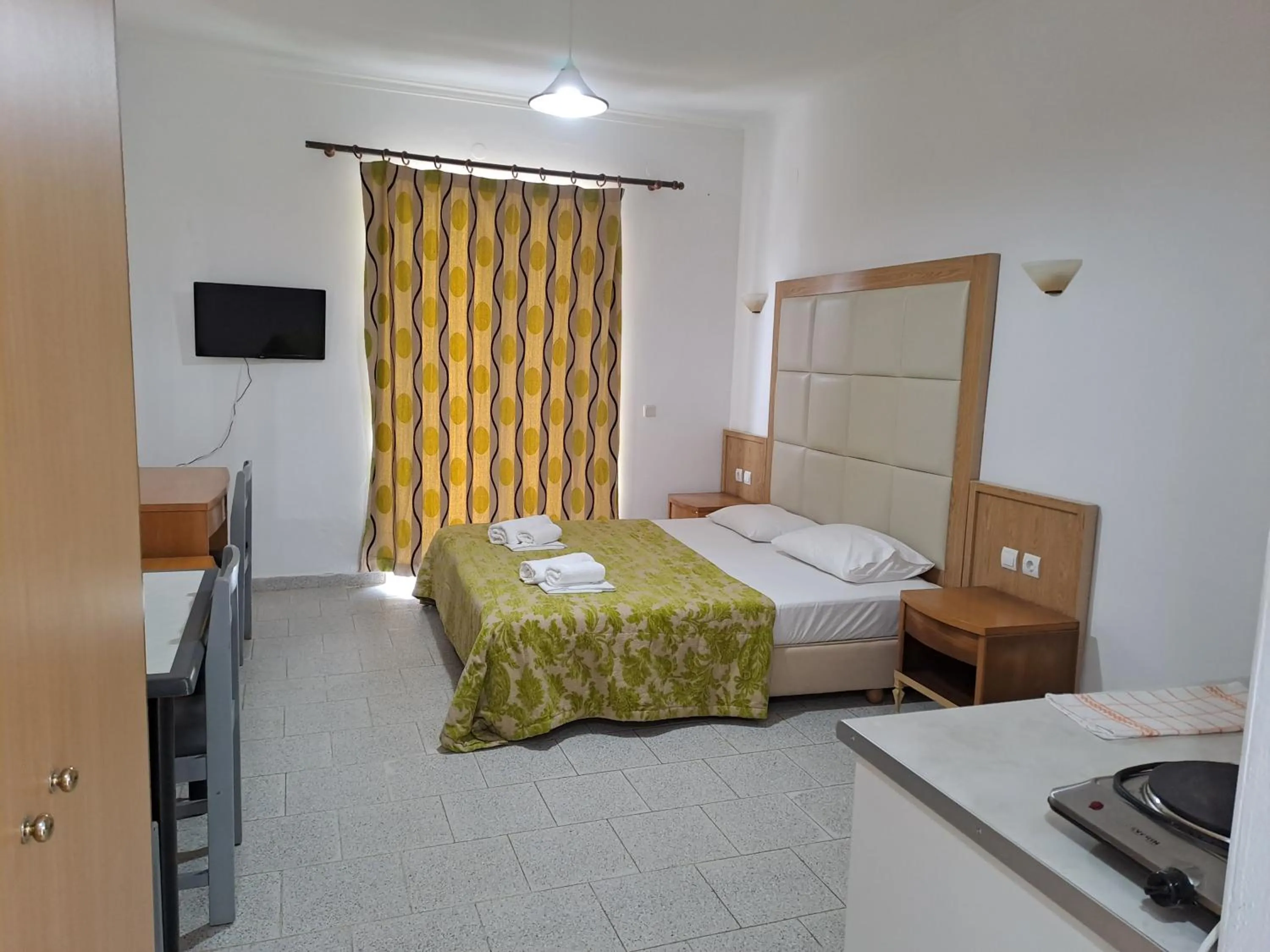 Bed in Haridimos Apartments