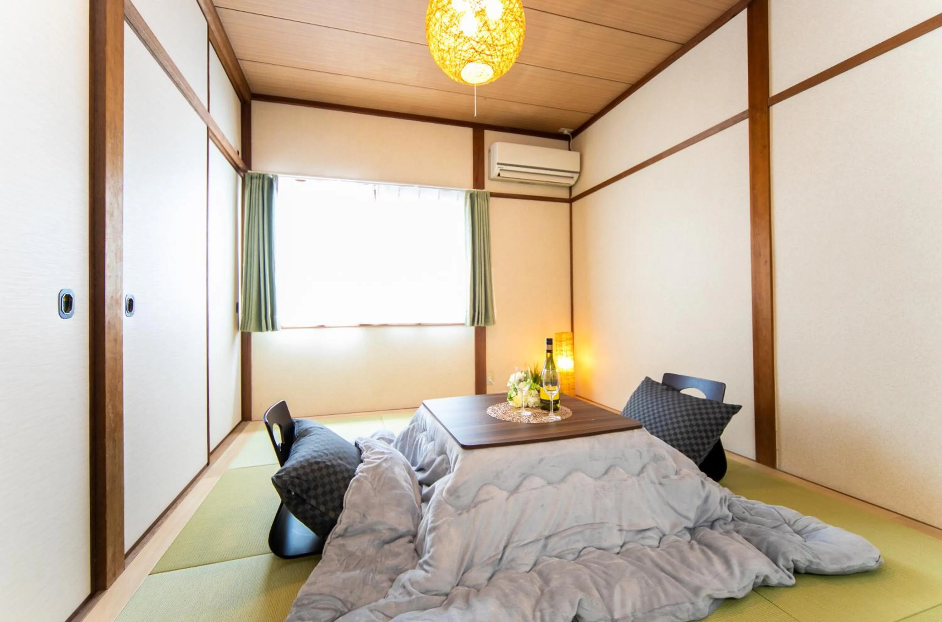 Bed in Takashima Lakeside Resort in Kitage