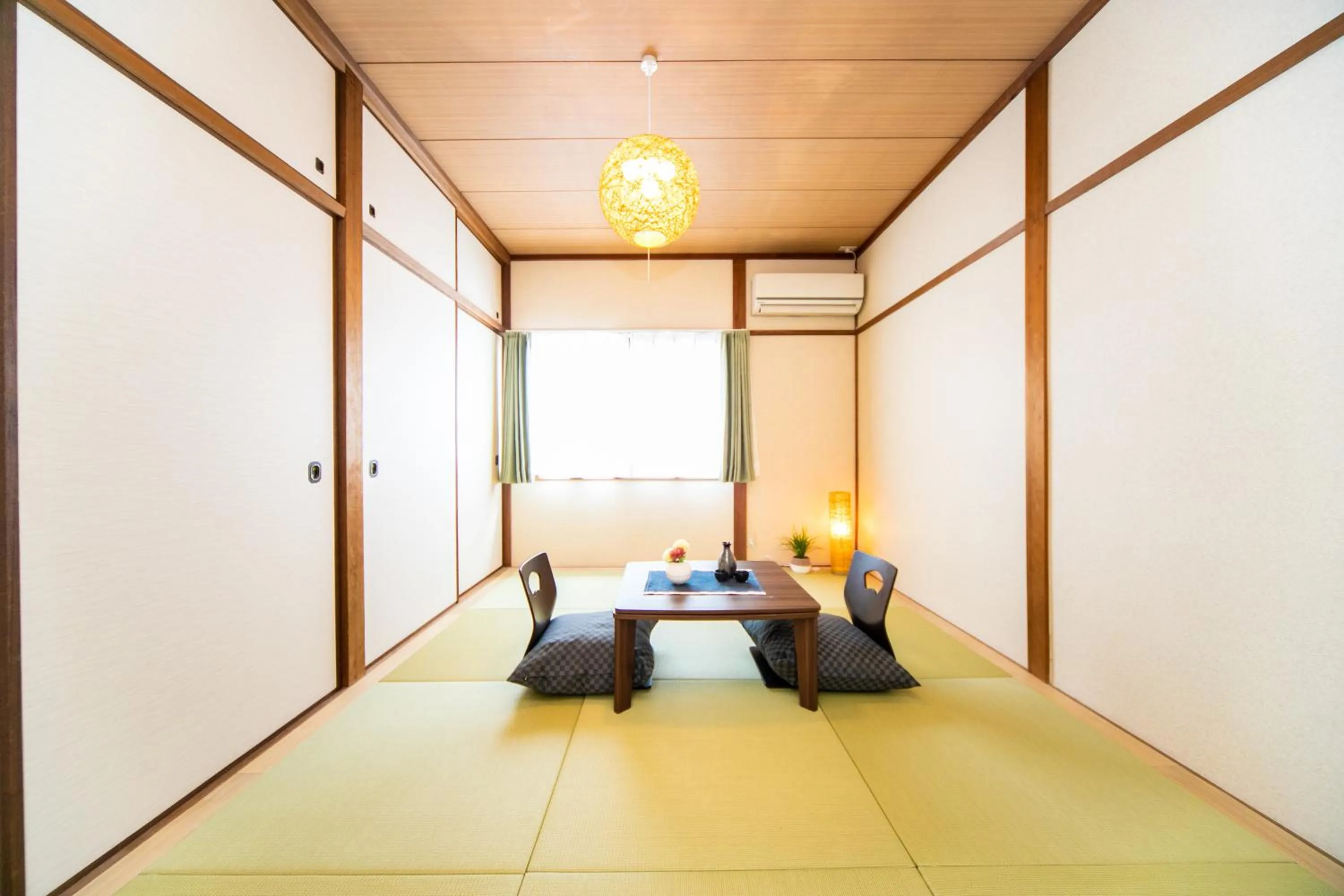 Bed in Takashima Lakeside Resort in Kitage