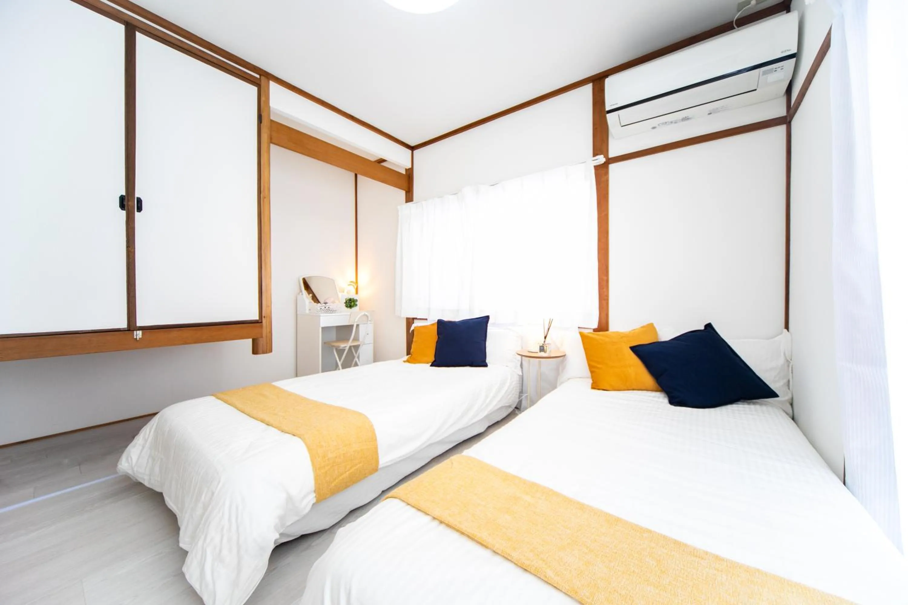 Bed in Takashima Lakeside Resort in Kitage