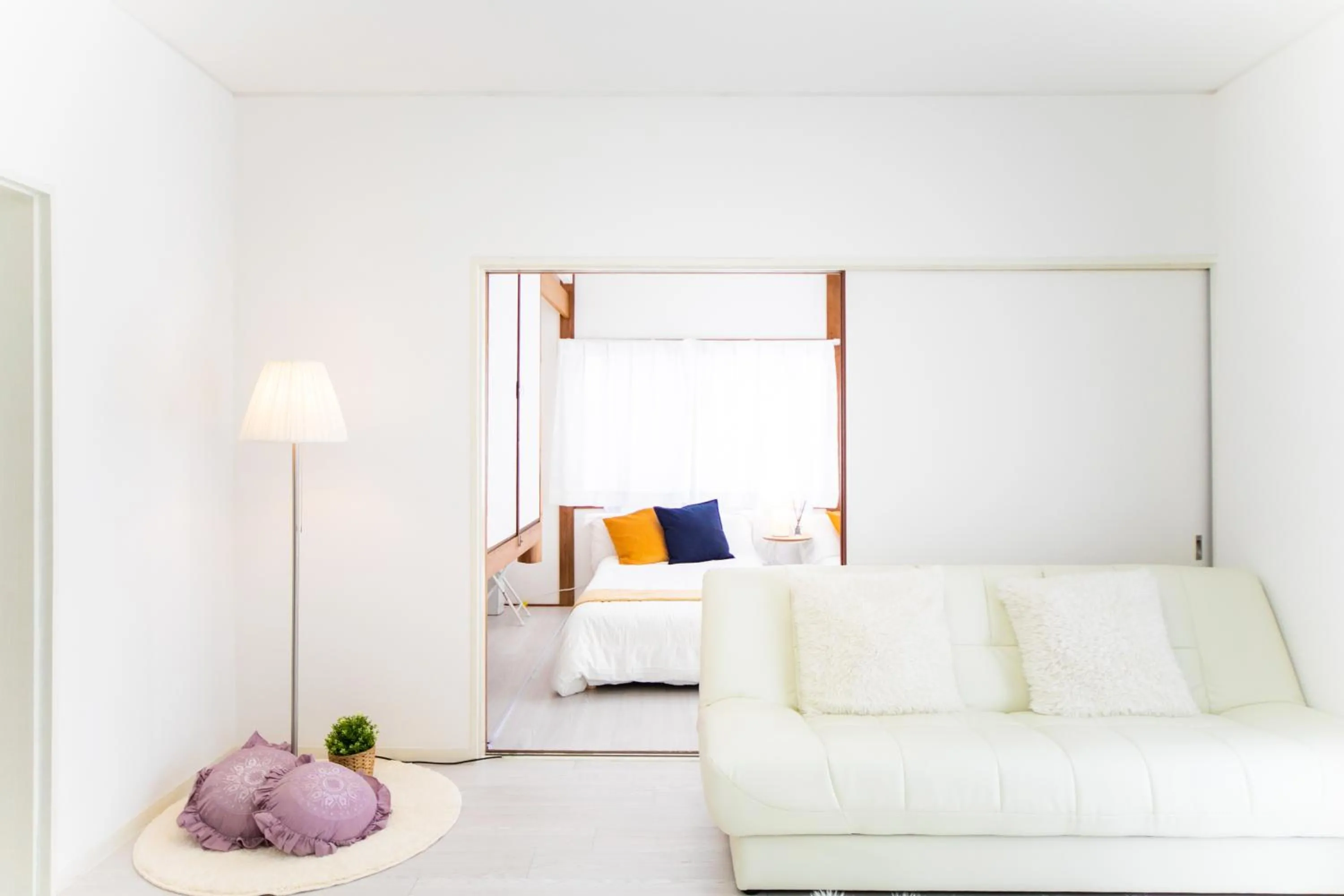 Living room, Bed in Takashima Lakeside Resort in Kitage