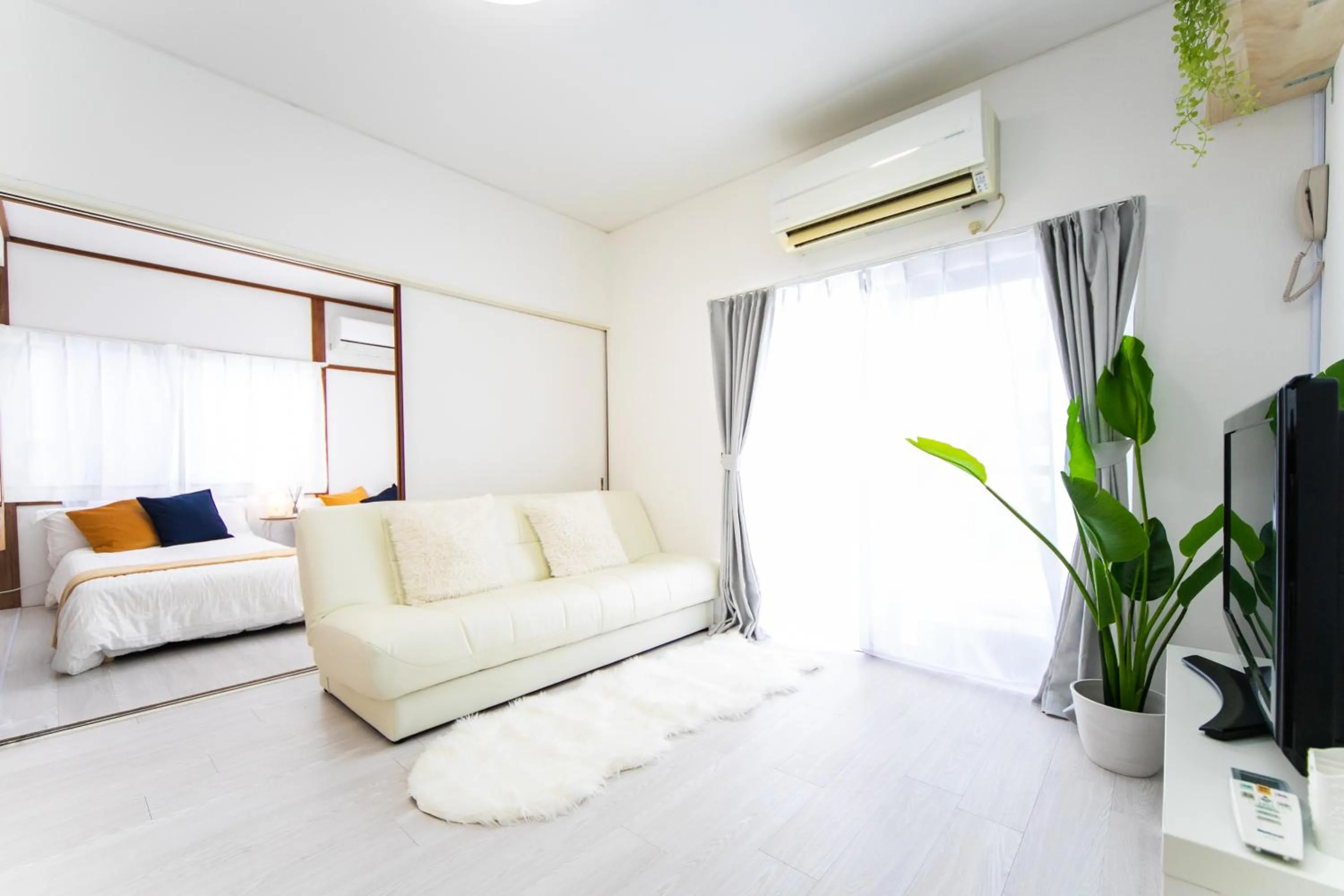 Bed in Takashima Lakeside Resort in Kitage