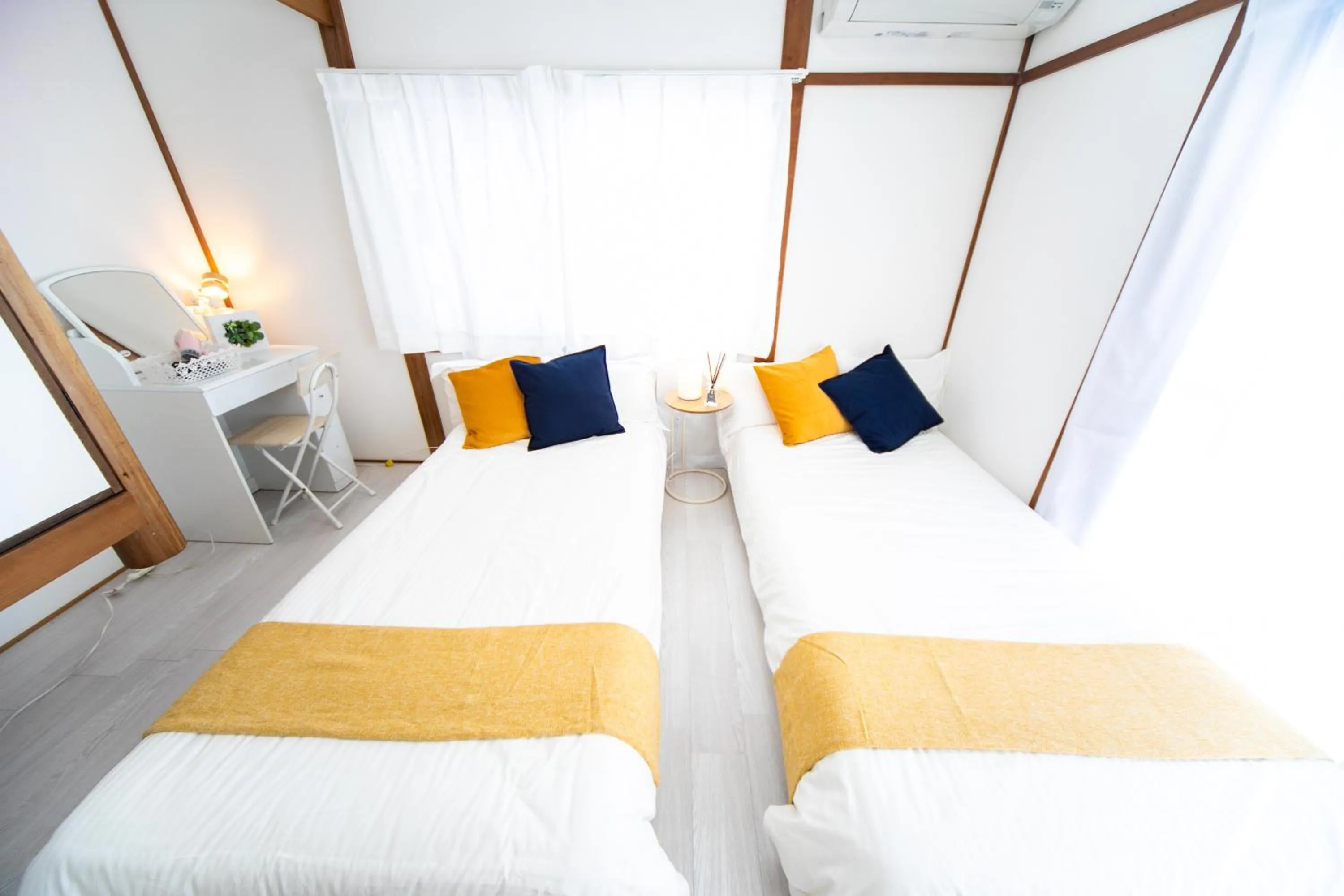 Bed in Takashima Lakeside Resort in Kitage