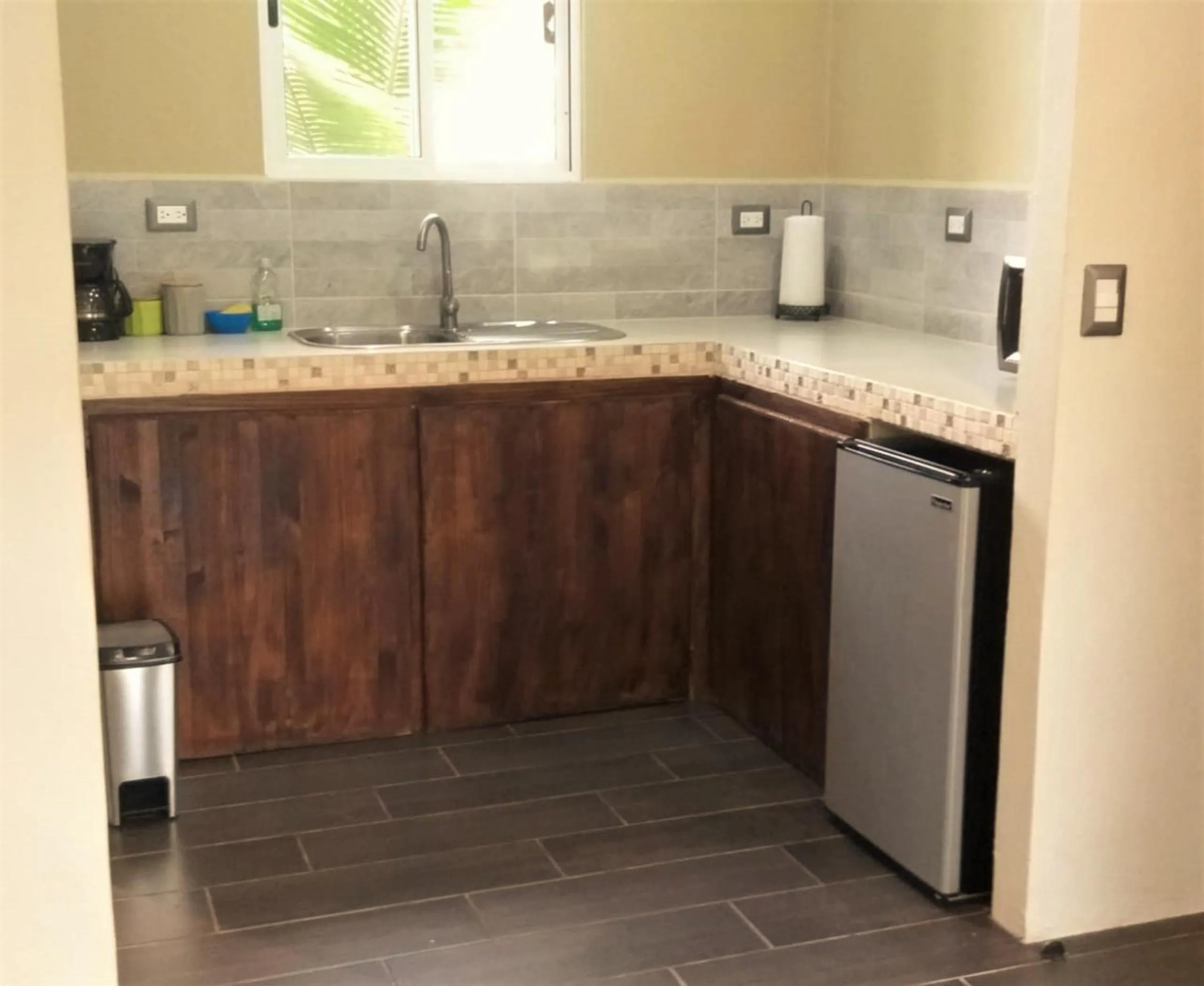 Kitchen or kitchenette in Tropical Suites & Villas