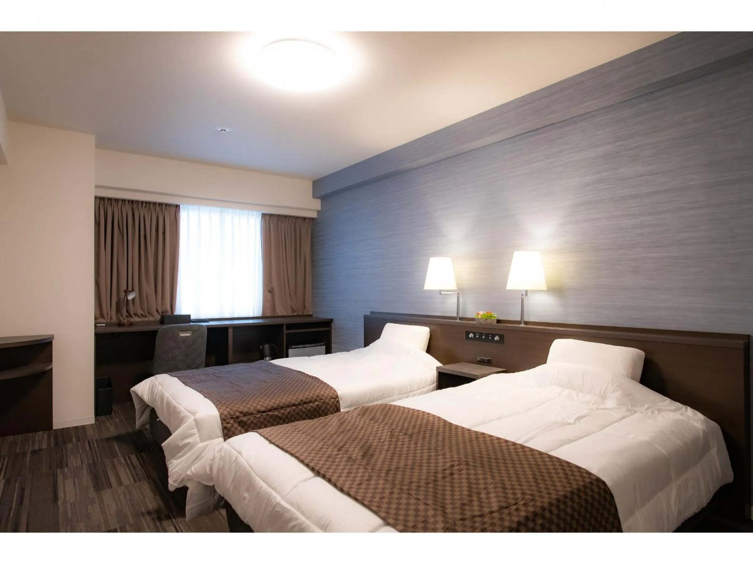 Photo of the whole room, Bed in Sakura Hotel Onomichi Ekimae
