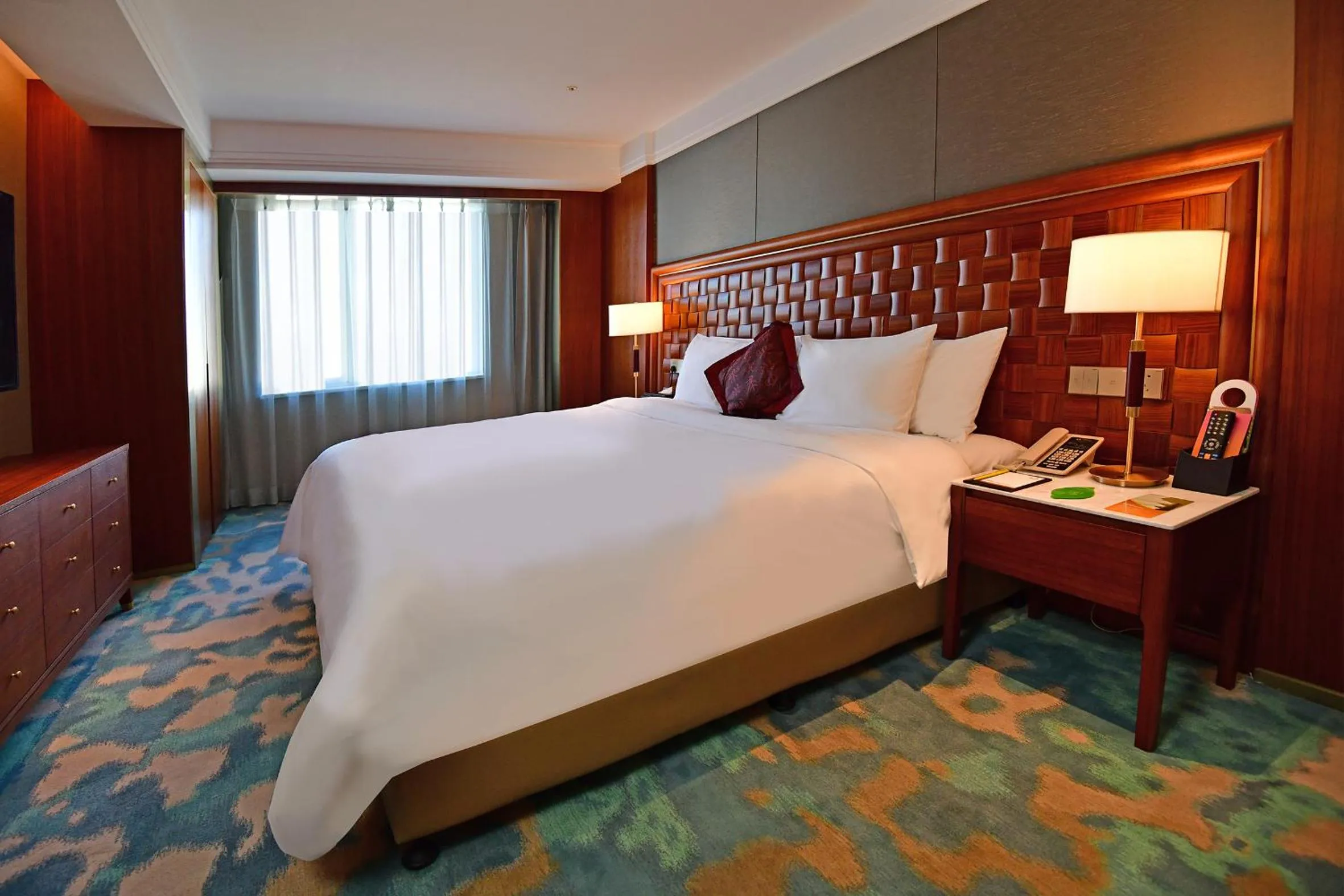 Bed in V-Continent Beijing Parkview Wuzhou Hotel