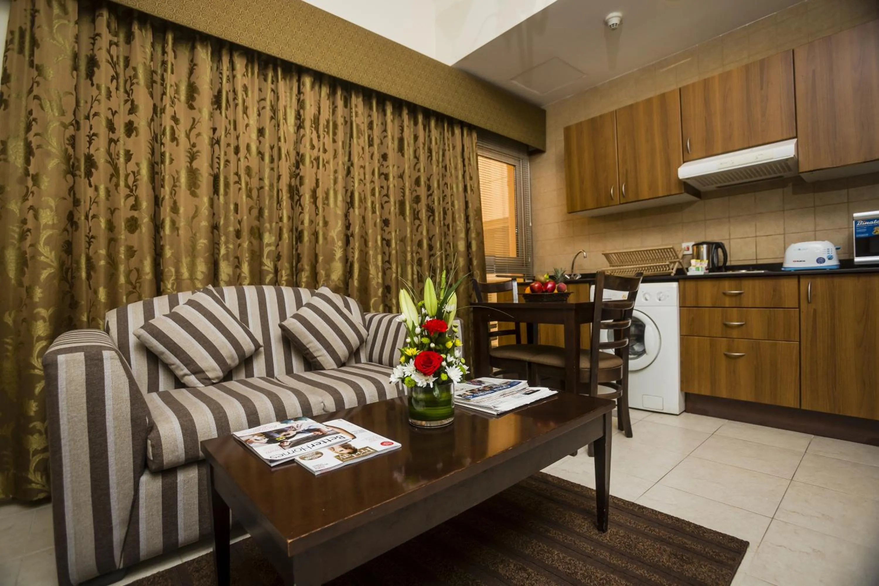 Kitchen or kitchenette in Arabian Dreams Hotel Apartments